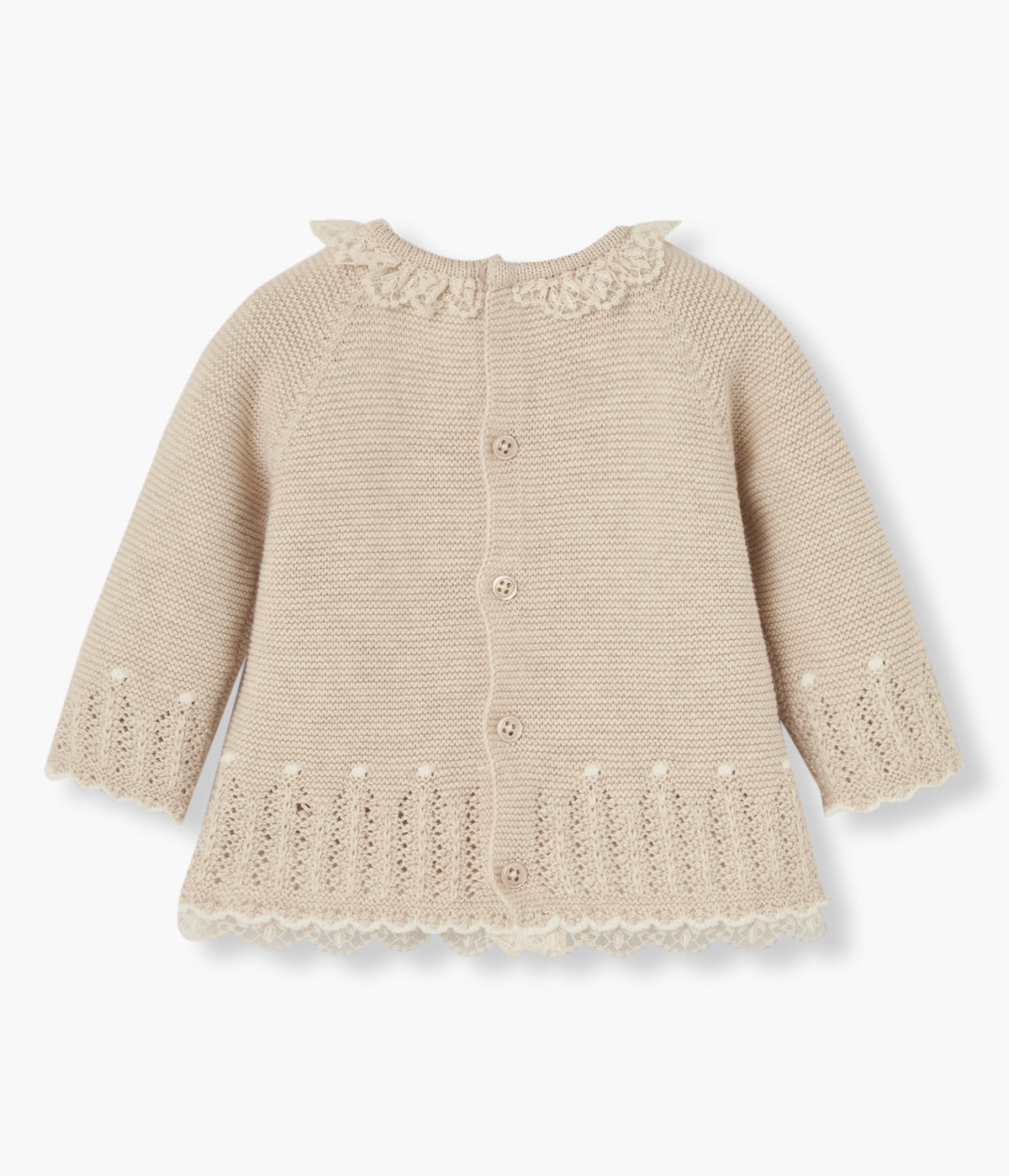 Conjunto de 2 peças em malha de algodão com caxemira pérola da Paz Rodríguez para bebé menina e recém-nascida. Camisola com gola folho e contorno inferior com renda detalhada e detalhes com textura na malha. Calças com pés detalhados a combinar com a camisola.