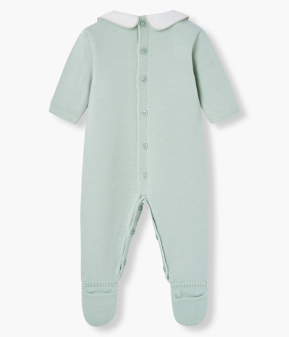 Babygrow em malha verde-água da Paz Rodríguez para bebé e recém-nascido(a). Elegante babygrow com gola redonda cortada branca, detalhes na malha e medalha da marca.