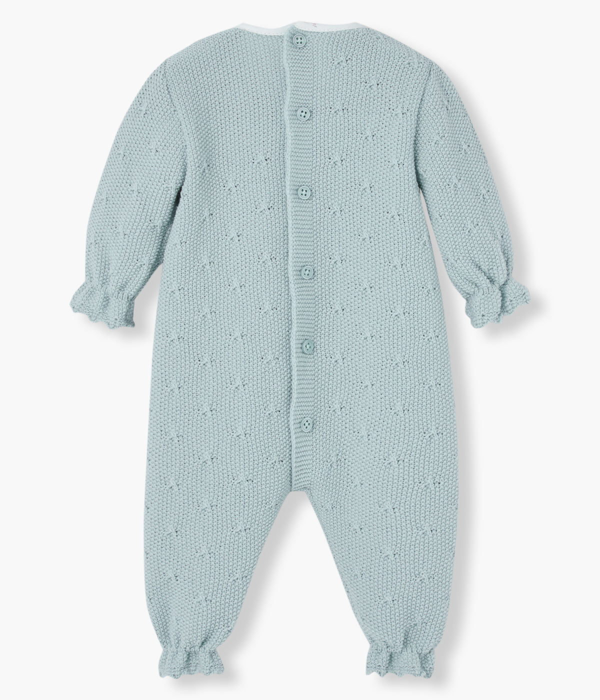 Babygrow em malha verde-água da Paz Rodríguez para bebé menina e recém-nascida. Elegante babygrow com peitilho de padrão floral em fundo pérola, detalhes na malha e pequeno laço com medalha da marca.