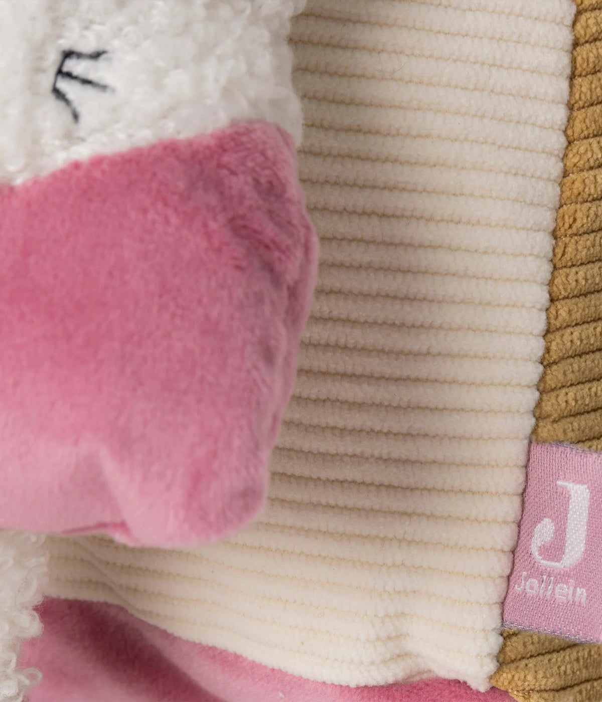 Triângulo de Atividades Flower Fairies da Jollein para bebé menina. Brinquedo sensorial em forma de castelo, com espelho, portas interativas, mordedor, texturas e elementos sonoros, perfeito para estimular o desenvolvimento do bebé enquanto brinca confortavelmente no parque ou tapete.