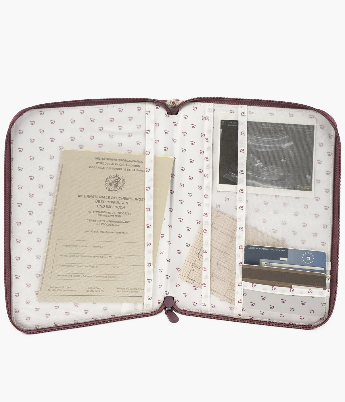 Porta documentos Cherry Flowers da Pasito a Pasito aberto com documentos do bebé guardados.