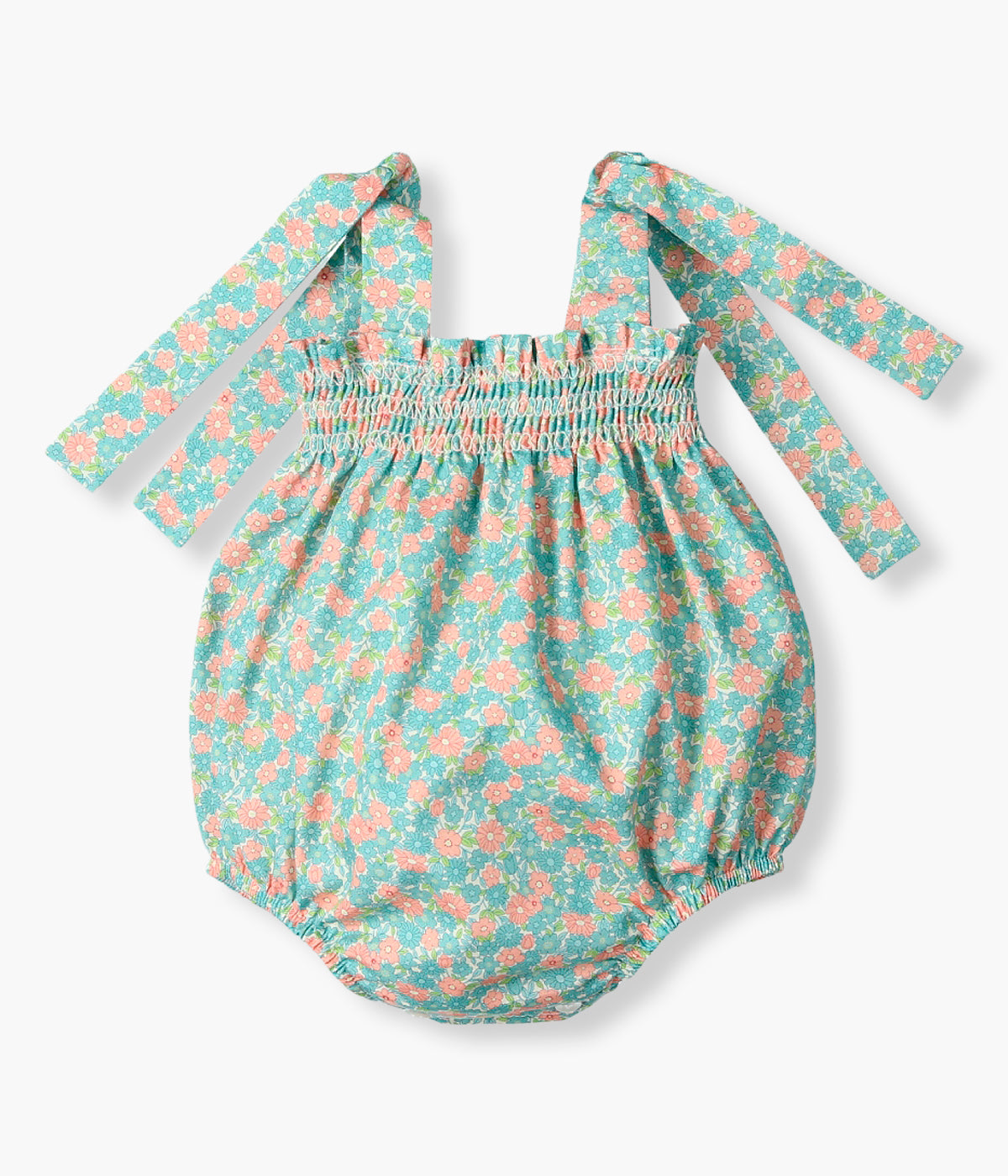 Fofo em algodão Mac Ilusión para bebé menina e recém‑nascida. Fresco fofo de alças com padrão floral em tons de azul, verde e rosa com suave elástico no peito. Abertura nas alças e entrepernas.