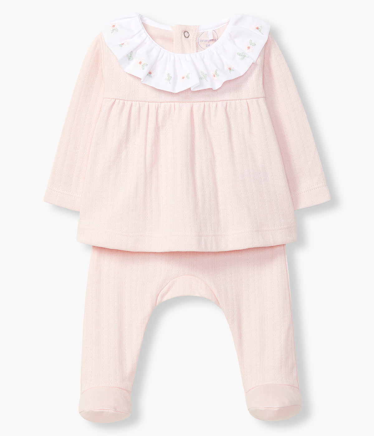 Vista de frente do conjunto em algodão orgânico composto por camisola e calças da Laranjinha para bebé menina e recém-nascida. Camisola de manga comprida com gola folho branca com flores bordadas e pequenos detalhes na malha. Calças com pés com malha a combinar com a camisola.