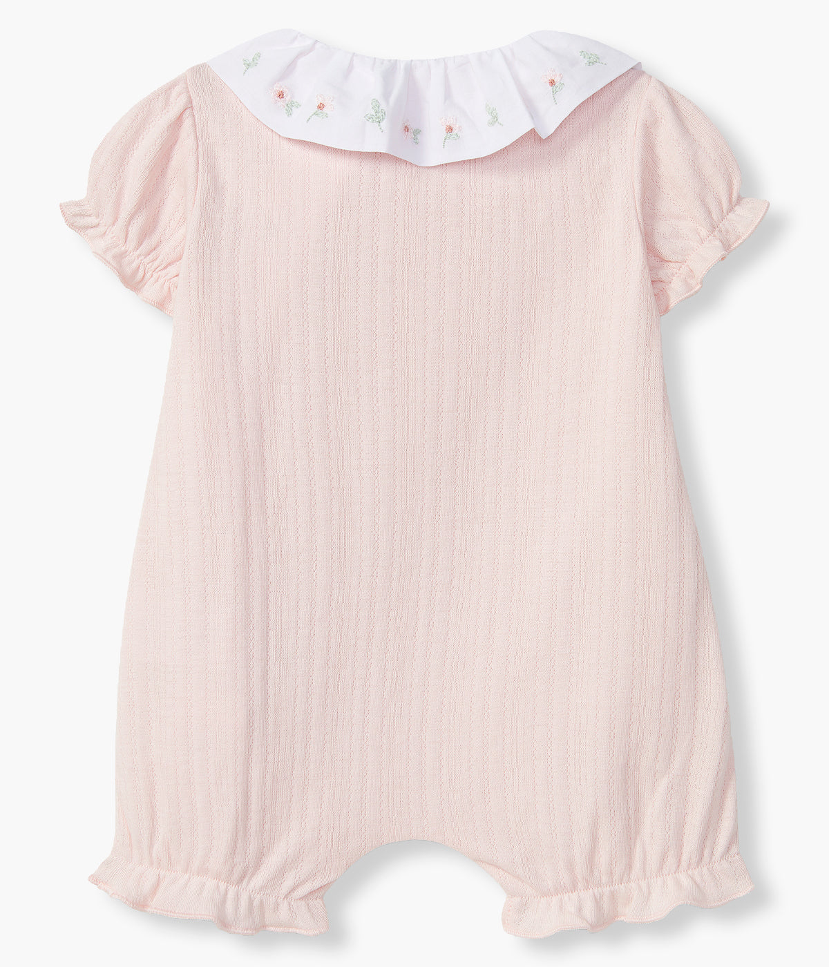 Vista de costas do fofo em algodão da Laranjinha para bebé menina e recém-nascida. Gola folho branca com pequenas flores bordadas. Detalhes na malha. Abertura na lateral com molas de pressão.