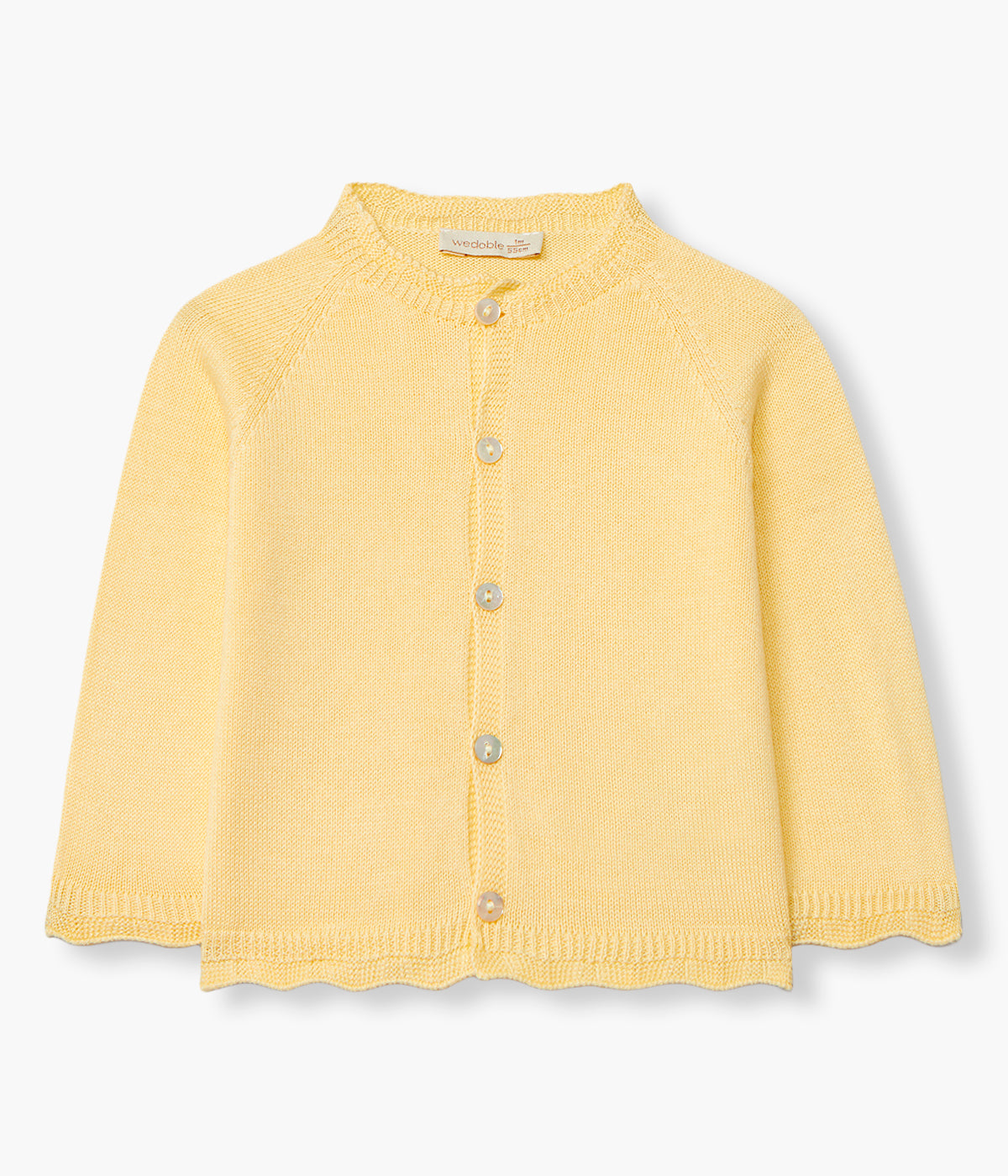 Vista de frente casaco em malha de algodão orgânico amarelo da Wedoble para bebé e recém-nascido(a). Suave e delicada malha com efeito ondulado nos contornos.