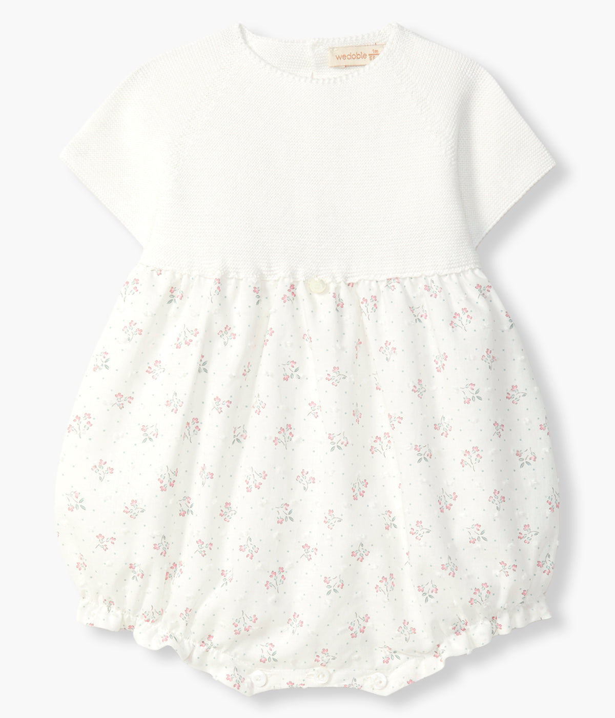 Vista de frente do fofo da Wedoble para bebé menina e recém-nascida. Elegante fofo com parte superior em malha de algodão orgânico pérola e parte inferior em tecido plumeti de algodão efeito balão com padrão floral.