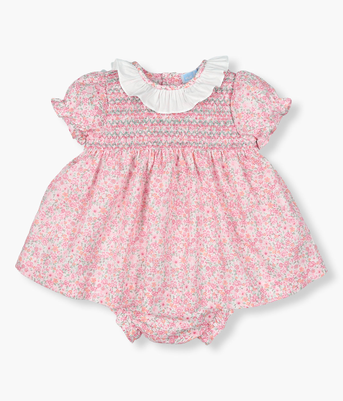 Vista de frente do vestido com tapa fraldas da Mac Ilusión para bebé menina e recém-nascida, 100% algodão. Elegante vestido com padrão floral em tons de rosa e verde, gola folho branca e favos no peito.