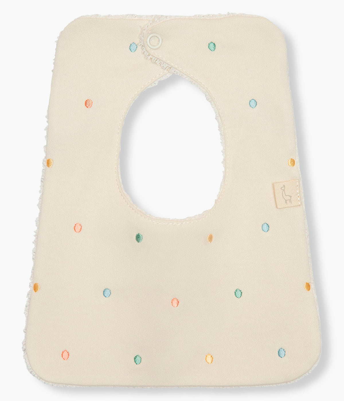 Vista de frente da babete impermeável bege da Baby Gi para bebé e recém-nascido(a), 100% algodão. Elegante babete de formato quadrado com pintas coloridas bordadas na frente absorvente tecido turco na face traseira.