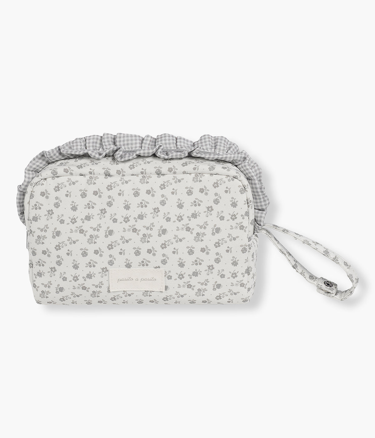 Vista de frente do necessaire Little Bloom Flowers da Pasito a Pasito. Ideal para transportar os produtos de higiene da bebé durante os passeios, este necessaire para bebé com exterior em loneta 100% algodão à prova de água com padrão floral oferece um espaço compacto e prático para manter tudo organizado.