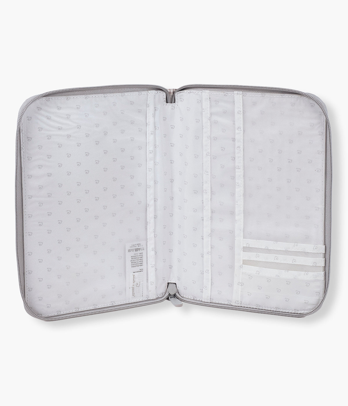 Vista aberta do Porta Documentos Little Bloom Flowers da Pasito a Pasito. Perfeito para organizar todos os documentos e exames da bebé, esta bolsa estilo livro possui um exterior em loneta 100% algodão resistente à água com delicado padrão floral cinza combinando elegância e funcionalidade no dia a dia.