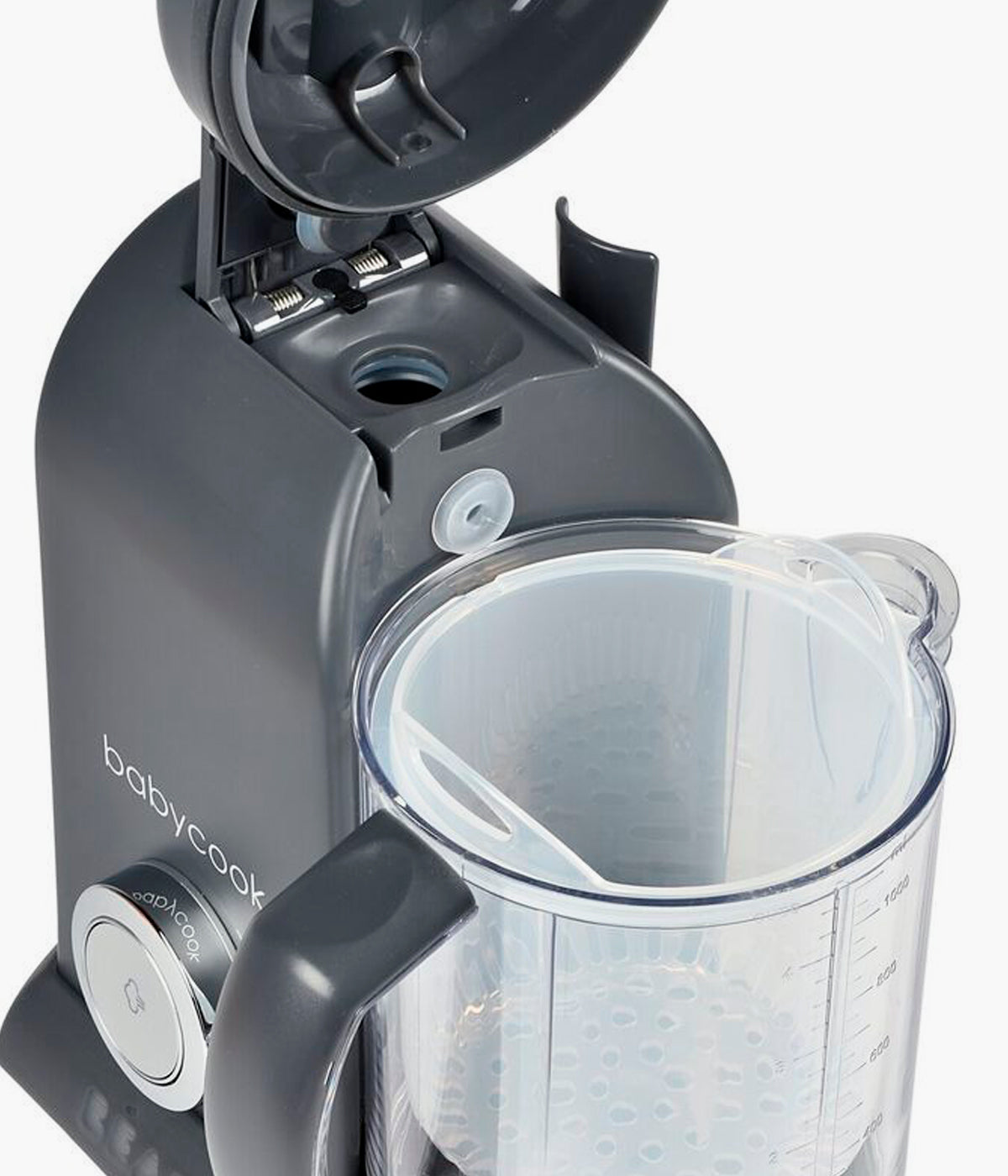Vista de cima do Robô de cozinha para bebé 4 em 1 Baby Cook Solo da Béaba na cor Dark Grey. Robô de cozinha 4 em 1 que cozinha a vapor, tritura, descongela e aquece alimentos. Com uma taça XL de 1100 ml e um funcionamento simples através de um único botão, permite preparar refeições caseiras saudáveis para o bebé de forma rápida, prática e sem complicações.