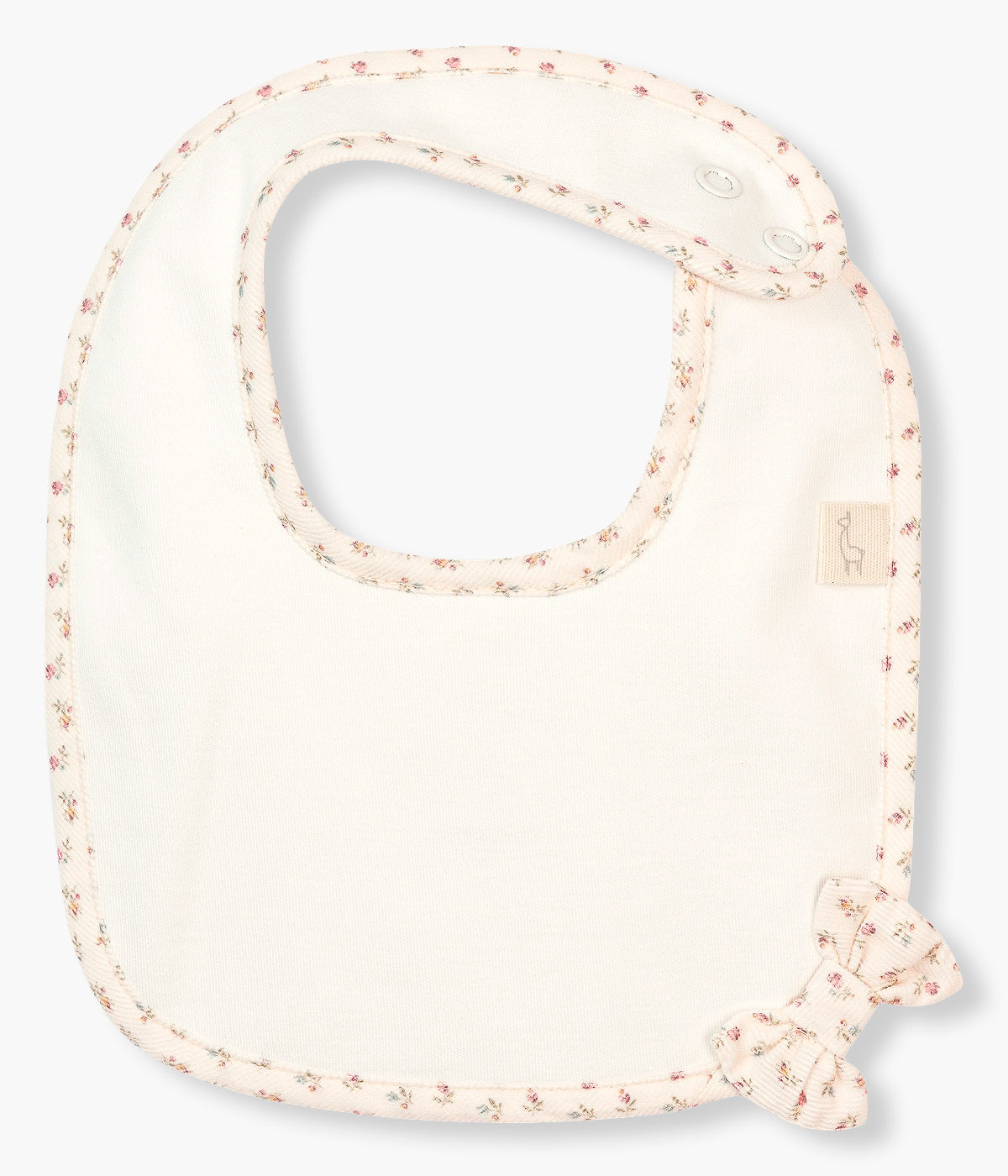 Vista frontal da babete pérola da Baby Gi para bebé menina e recém-nascida, 100% algodão. Elegante babete de formato quadrado com laço e contornos com padrão de pequenas flores.