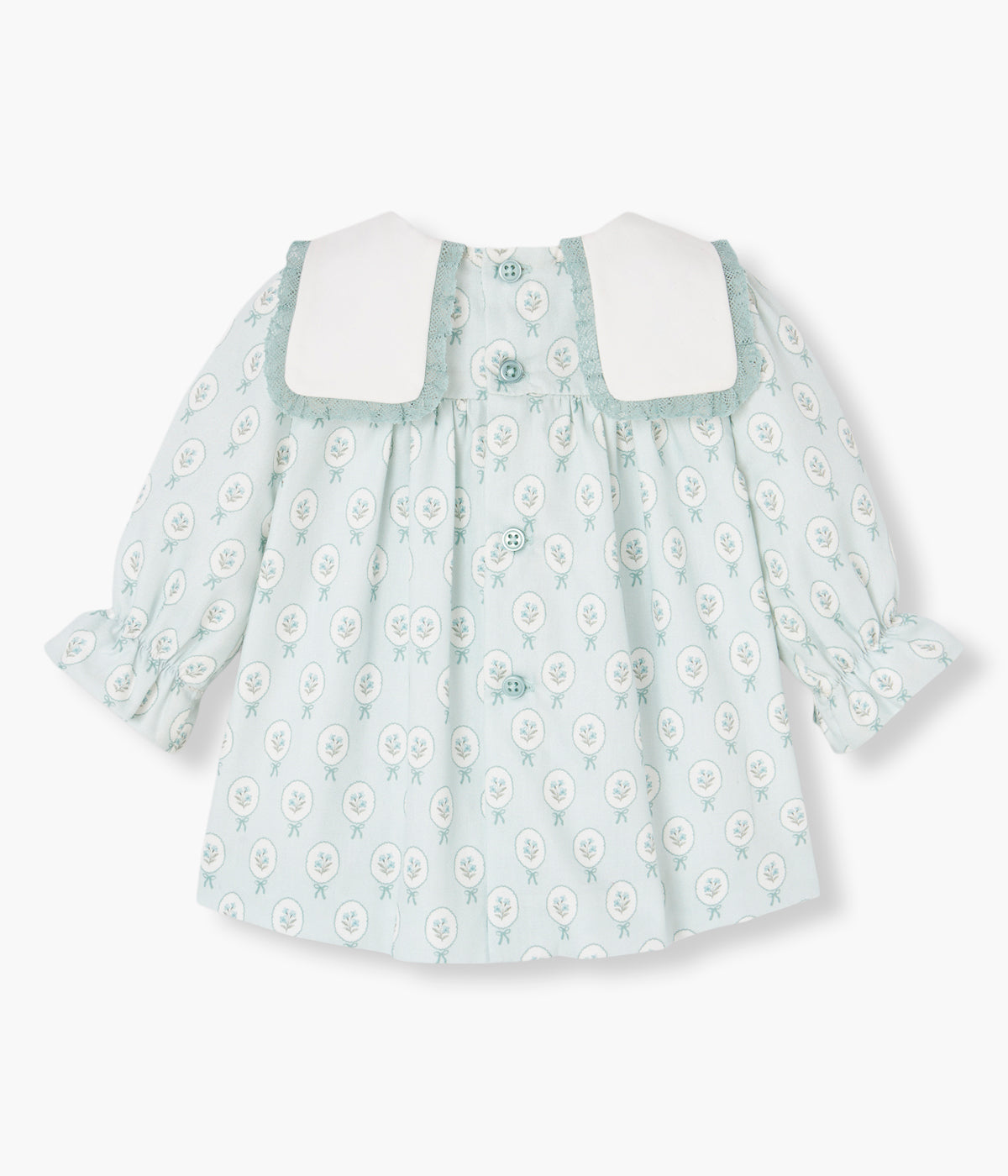Vista frontal do vestido com tapa fraldas em algodão da Paz Rodríguez para bebé menina e recém-nascida.