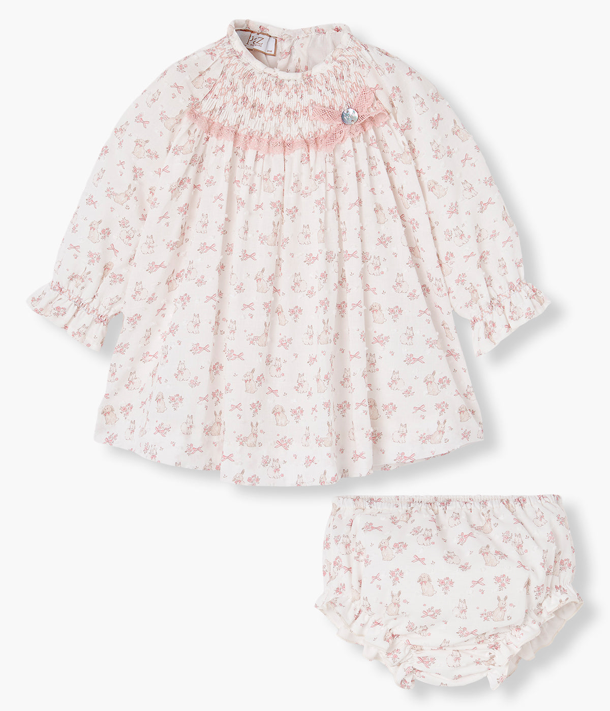 Vista do vestido com tapa fraldas em algodão com padrão coelho da Paz Rodríguez para bebé menina e recém-nascida.