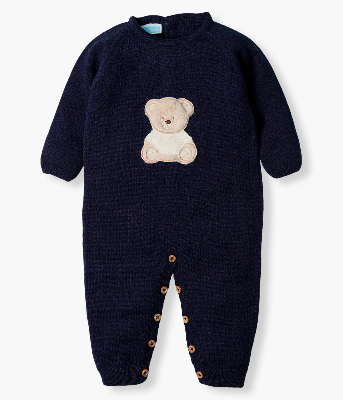Vista frontal do babygrow em malha azul-marinho da Mac Ilusión para bebé e recém-nascido(a). Elegante babygrow de abertura nas costas e entrepernas com detalhe de urso no peito.