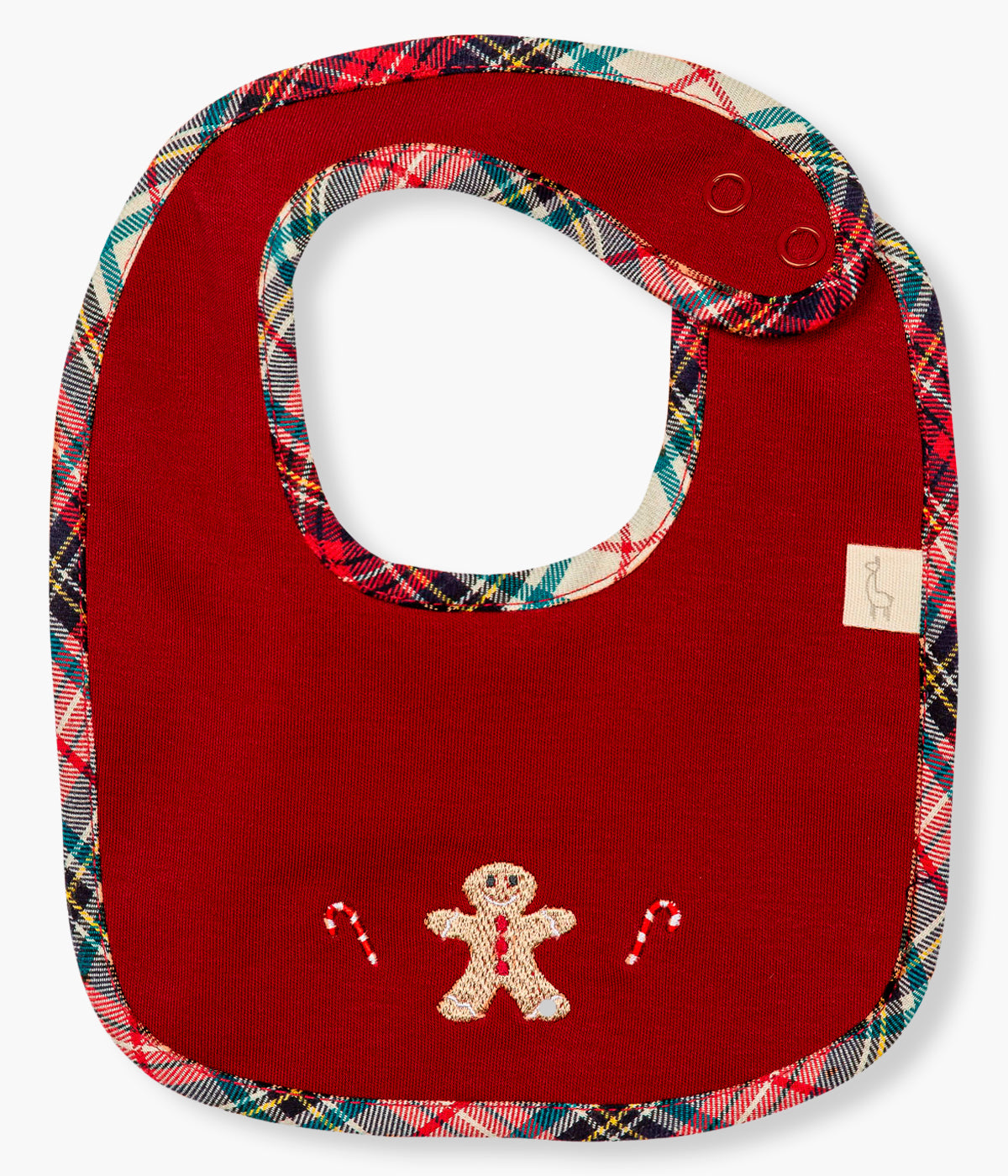 Vista frontal da babete vermelha da Baby Gi para bebé e recém-nascido(a), 100% algodão. Elegante babete de formato quadrado com rebordo em padrão xadrez e boneco gengibre e duas bengalas bordadas na frente.