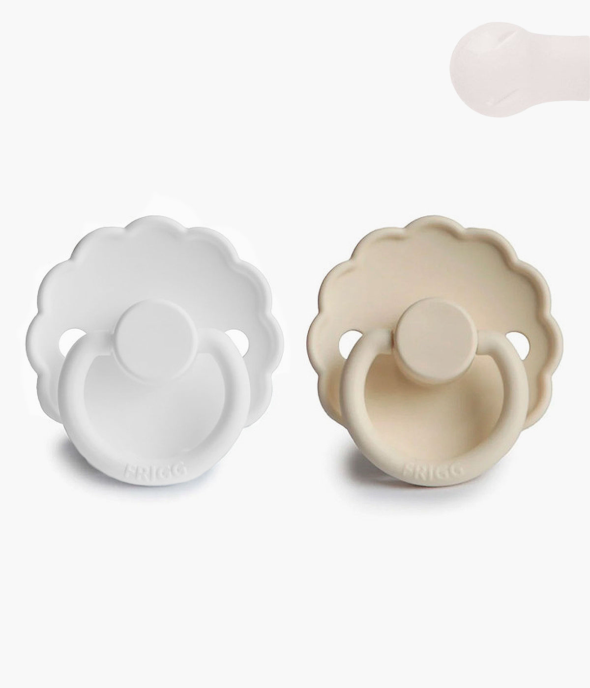 Pack de 2 Chupetas Frigg Daisy de design inspirado nas pétalas de uma flor. Conjunto composto por 1 chupeta branca (Bright White) e 1 chupeta pérola (cream) com tetina redonda em silicone.