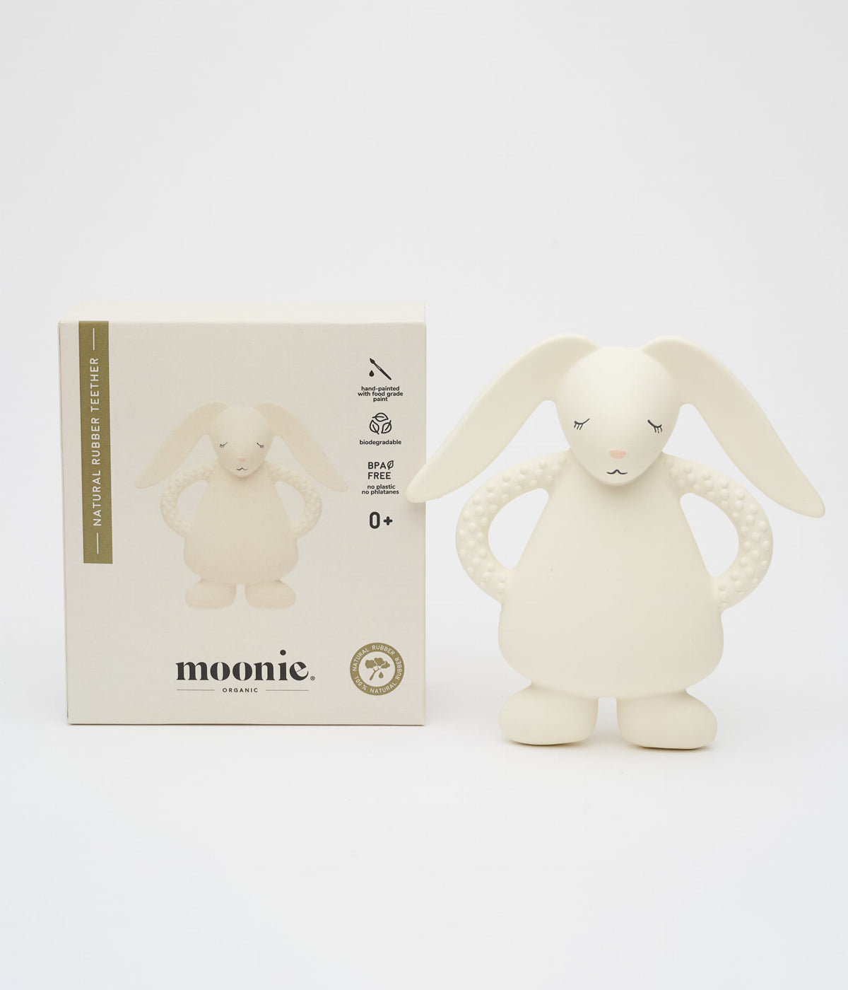 Mordedor Moonie cream em borracha natural com design ergonómico e seguro para bebés com caixa de cartão.