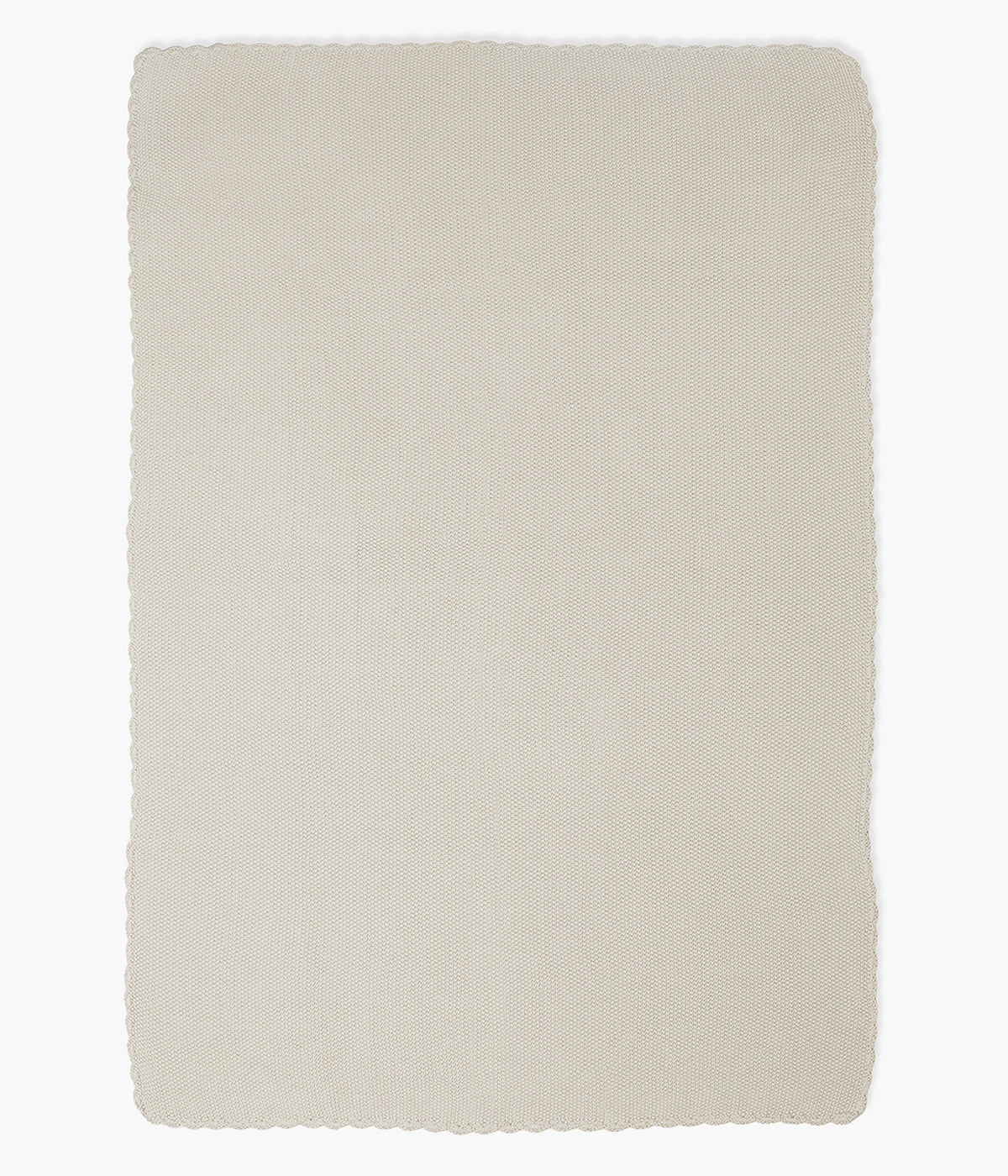 Manta de malha em algodão tricot bege da Pasito a Pasito para bebé e recém-nascido(a) com rebordo ondulado.
