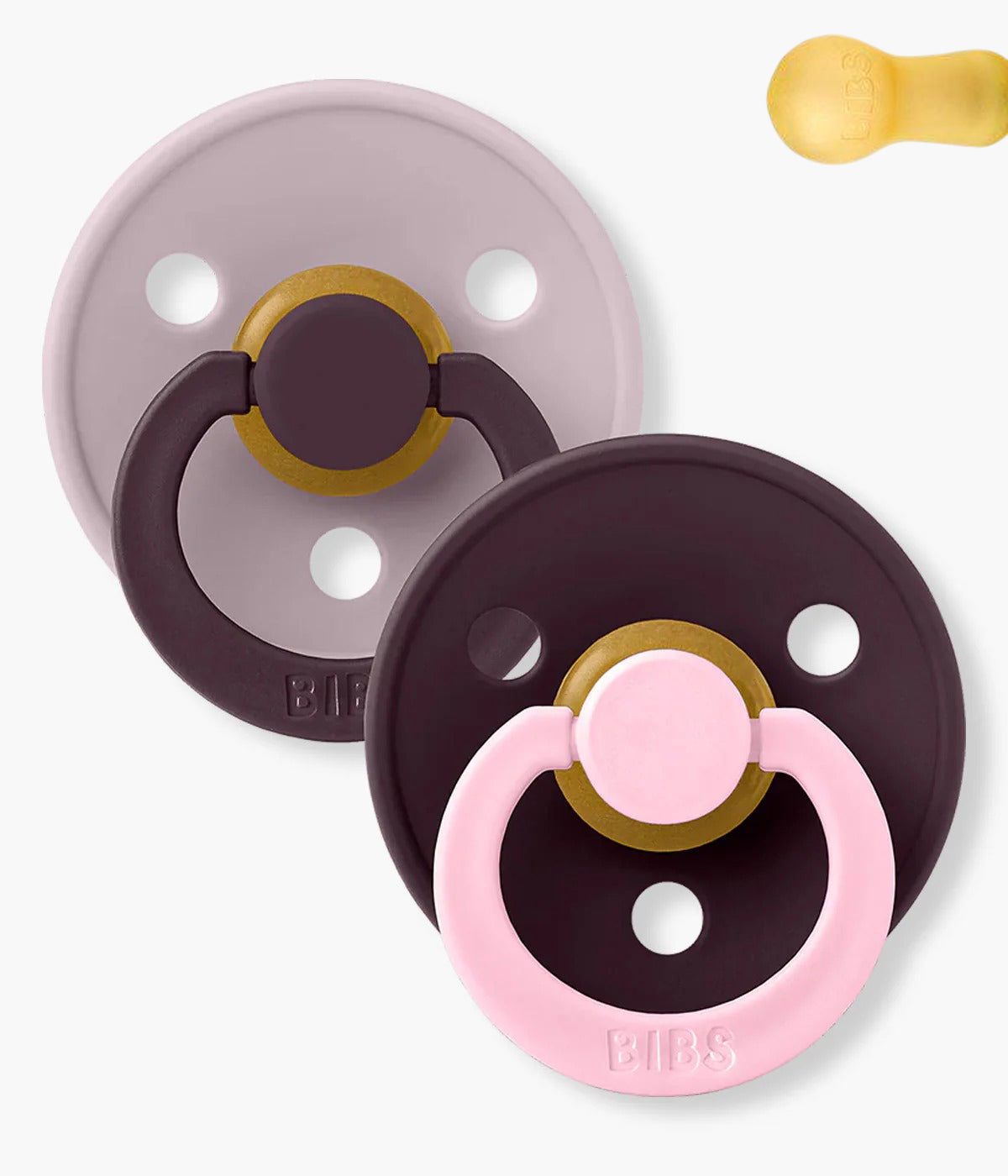 Pack de 2 chupetas Studio Colour Fusion Dusky Lilac Plum com tetina redonda em borracha 100% natural. Conjunto composto por 1 chupeta lilás (dusky lilac) e 1 chupeta roxa (plum).