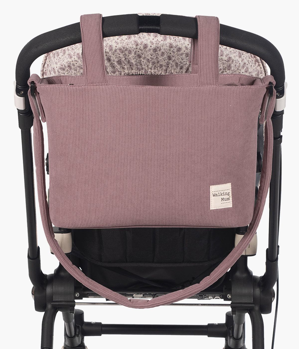 Bolsa de passeio em Bombazine Gala Cerise da Walking Mum penduradano carrinho.