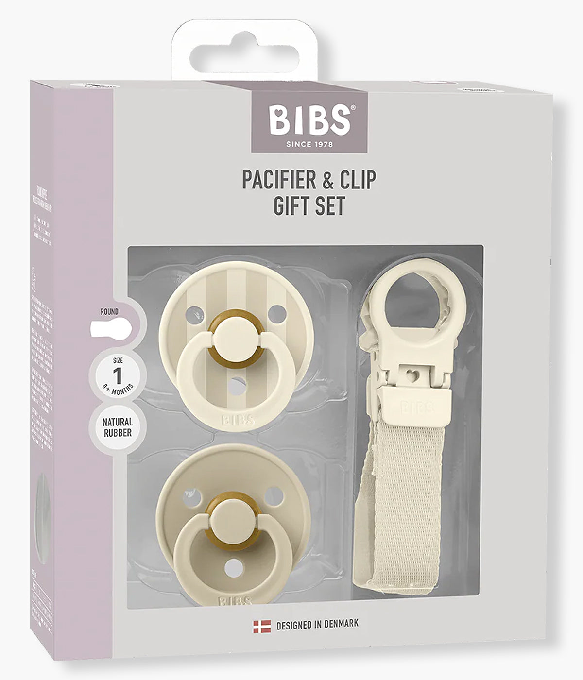 Pack de 2 chupetas Bibs Colour e 1 prende-chupetas Bibs Loop, ambos na cor marfim (ivory). Pensado especialmente para recém-nascidos, este pack reúne dois essenciais indispensáveis: chupetas Colour com tetina redonda em látex natural e um prende-chupetas funcional que evita quedas e perdas.
