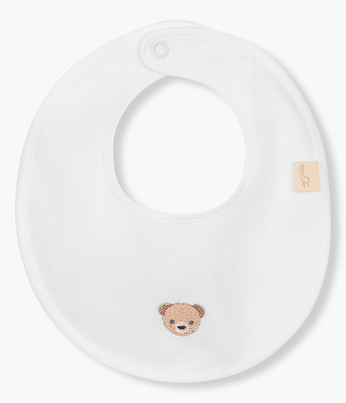Vista de frente da babete impermeável branco da Baby Gi para bebé e recém-nascido(a), 100% algodão. Elegante babete redonda com urso bordado em castanho na frente.