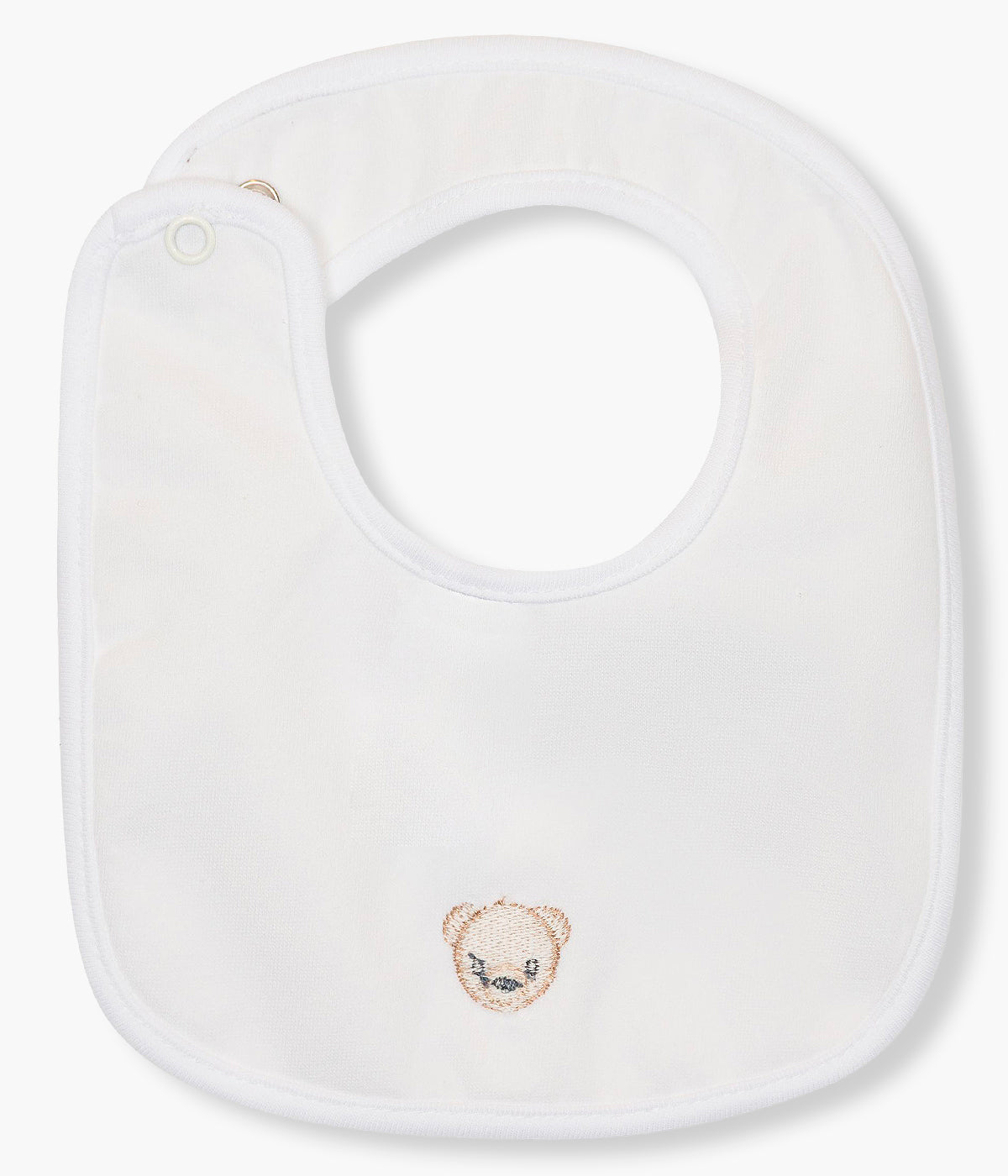 Vista de tras da babete impermeável branca da Baby Gi para bebé e recém-nascido(a), 100% algodão. Elegante babete de formato retangular com urso bordado em castanho na frente.
