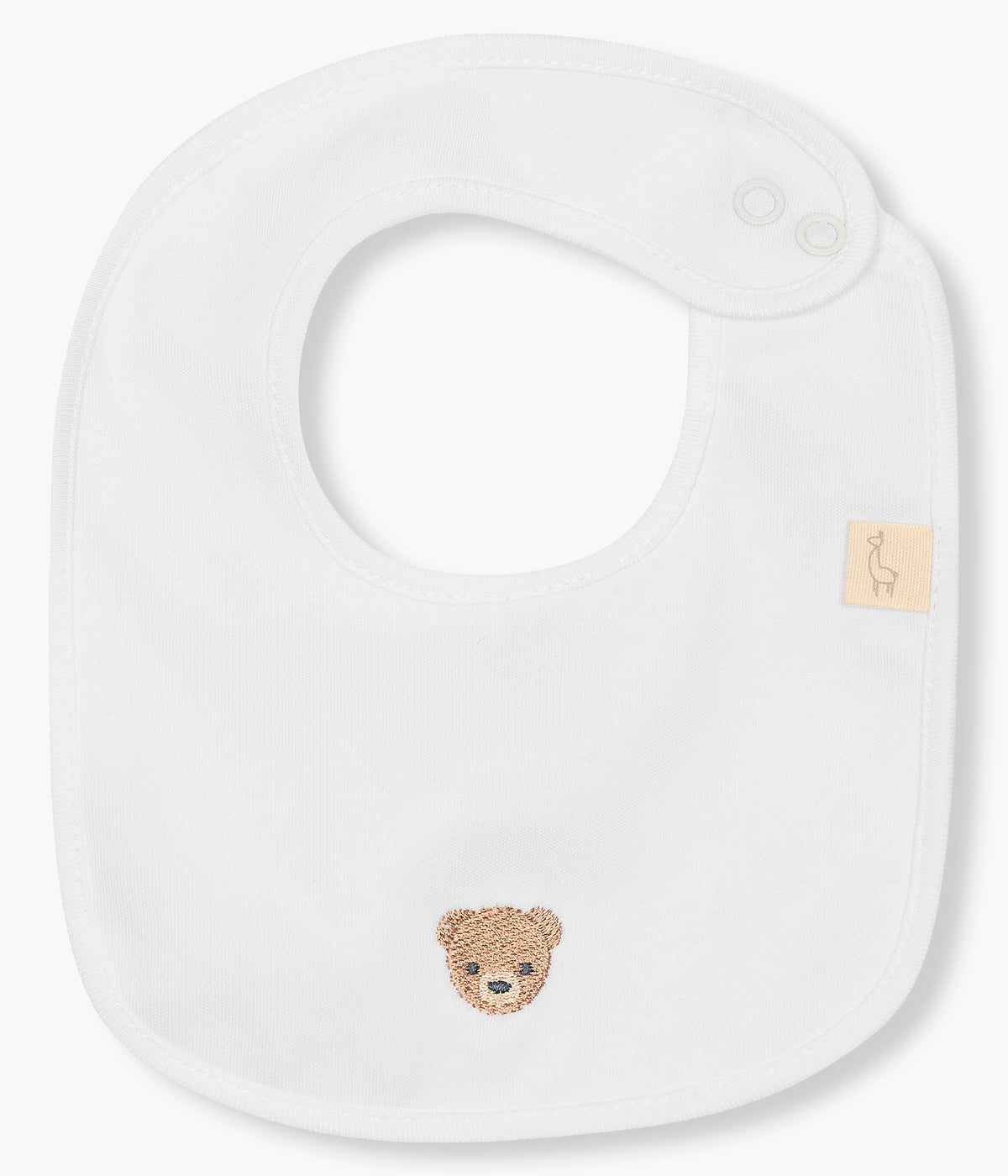 Vista de frente da babete impermeável branca da Baby Gi para bebé e recém-nascido(a), 100% algodão. Elegante babete de formato retangular com urso bordado em castanho na frente.