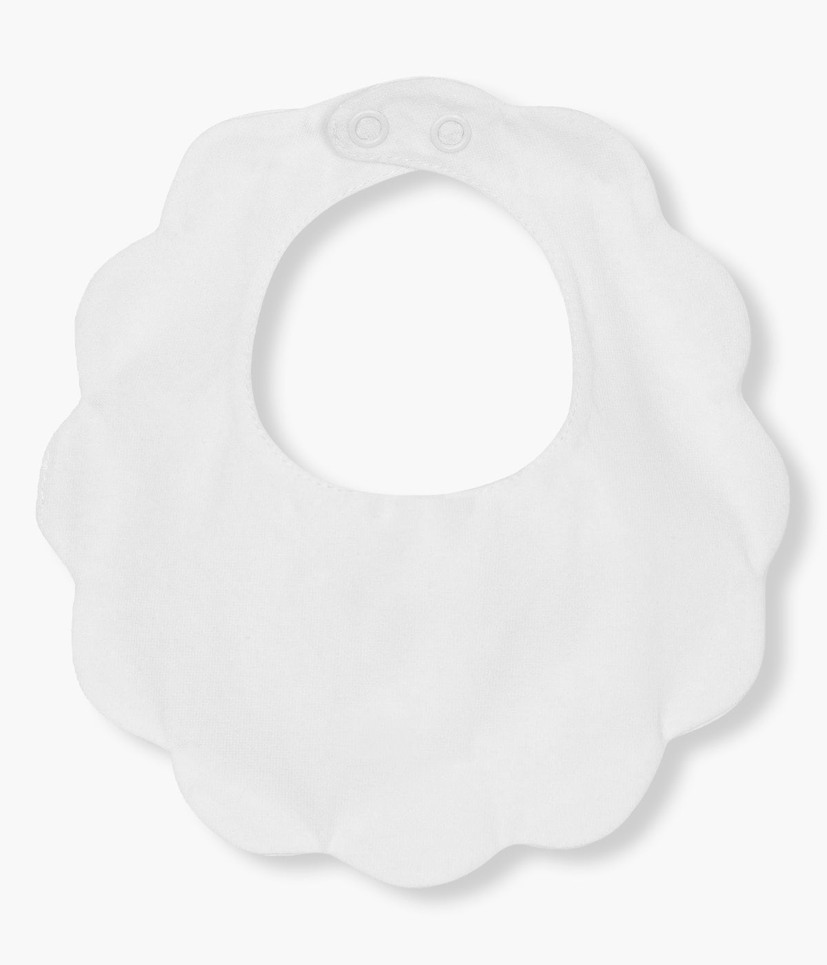 Vista de frente da babete impermeável branca da Baby Gi para bebé e recém-nascido(a), 100% algodão. Elegante babete em tecido piquet com rebordo ondulado e pequenas pintas em rosa.