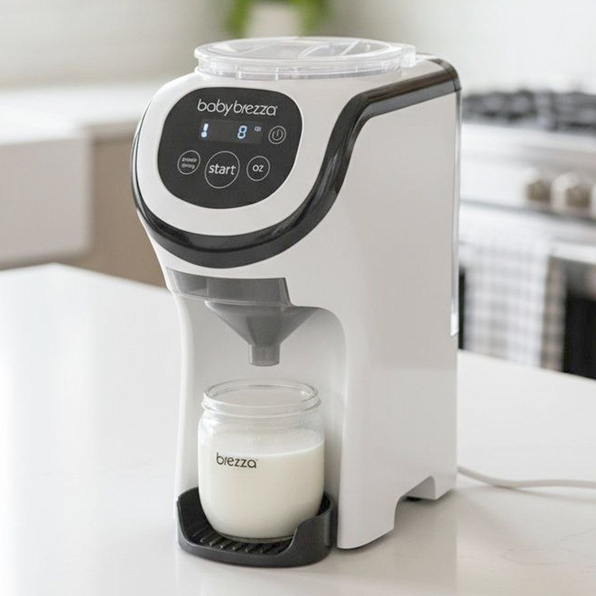 Preparadores de biberões automáticos Baby Brezza e Béaba.