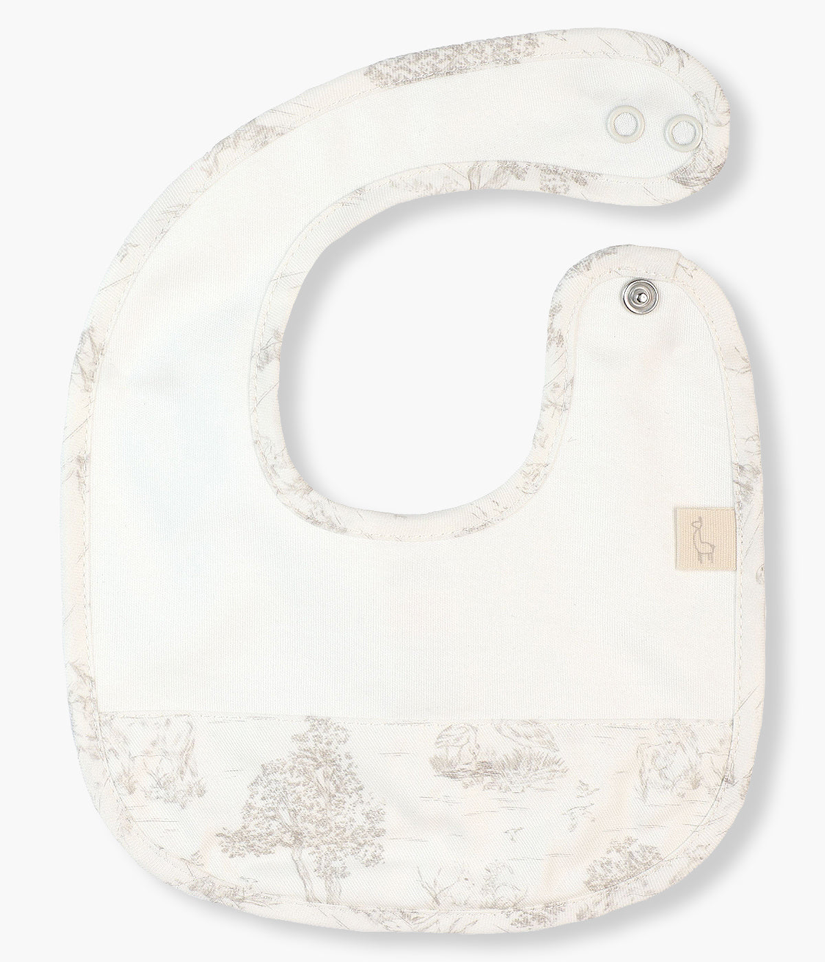 Babete impermeável pérola da Baby Gi para bebé e recém-nascido(a), 100% algodão. Contorno a toda a volta e detalhe na frente com padrão toile de jouy.