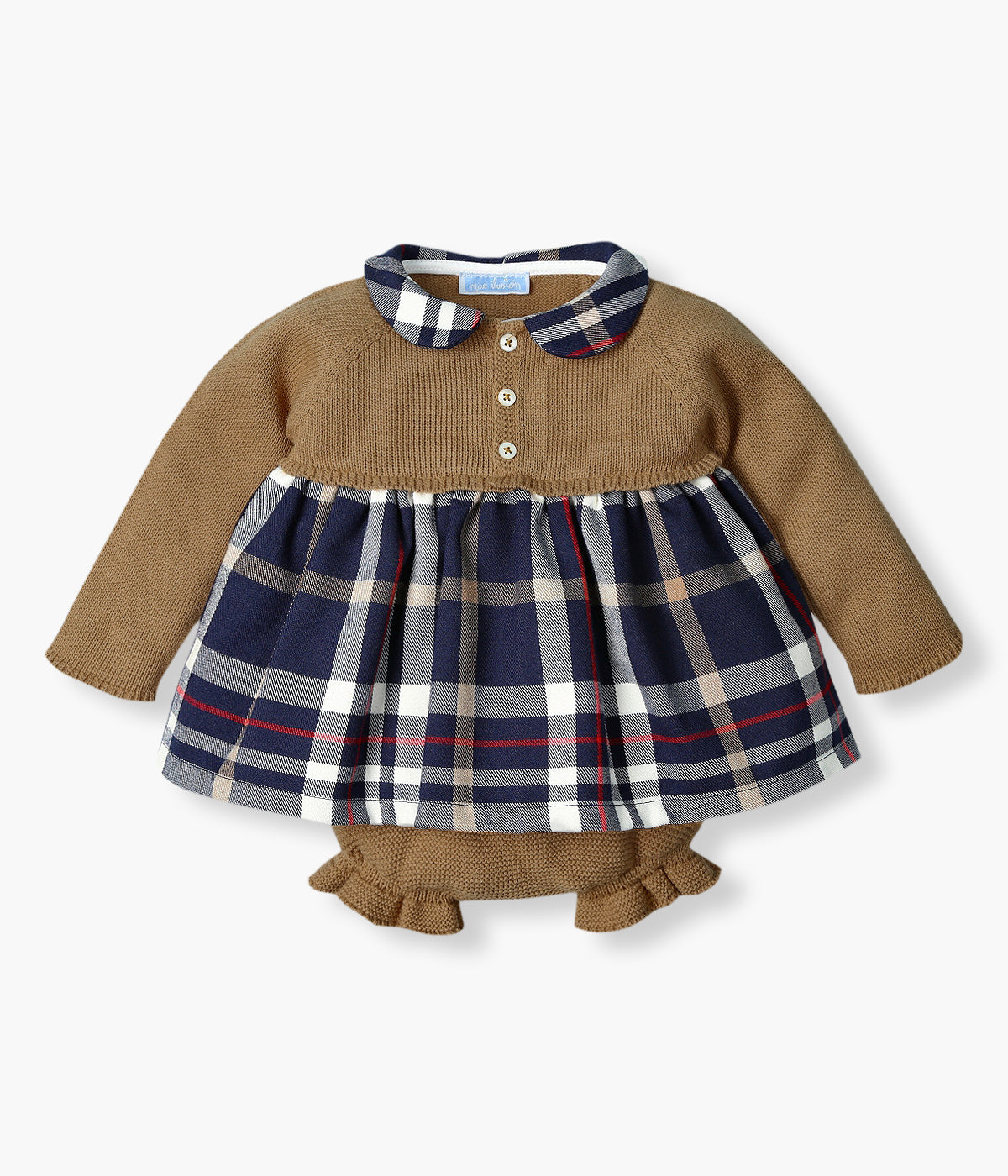 Vestido com tapa fraldas da Mac Ilusión para bebé menina e recém-nascida. Vestido em malha bege com gola redonda cortada e parte inferior forrada em azul-marinho com padrão xadrez. Tapa fraldas em malha bege a combinar.