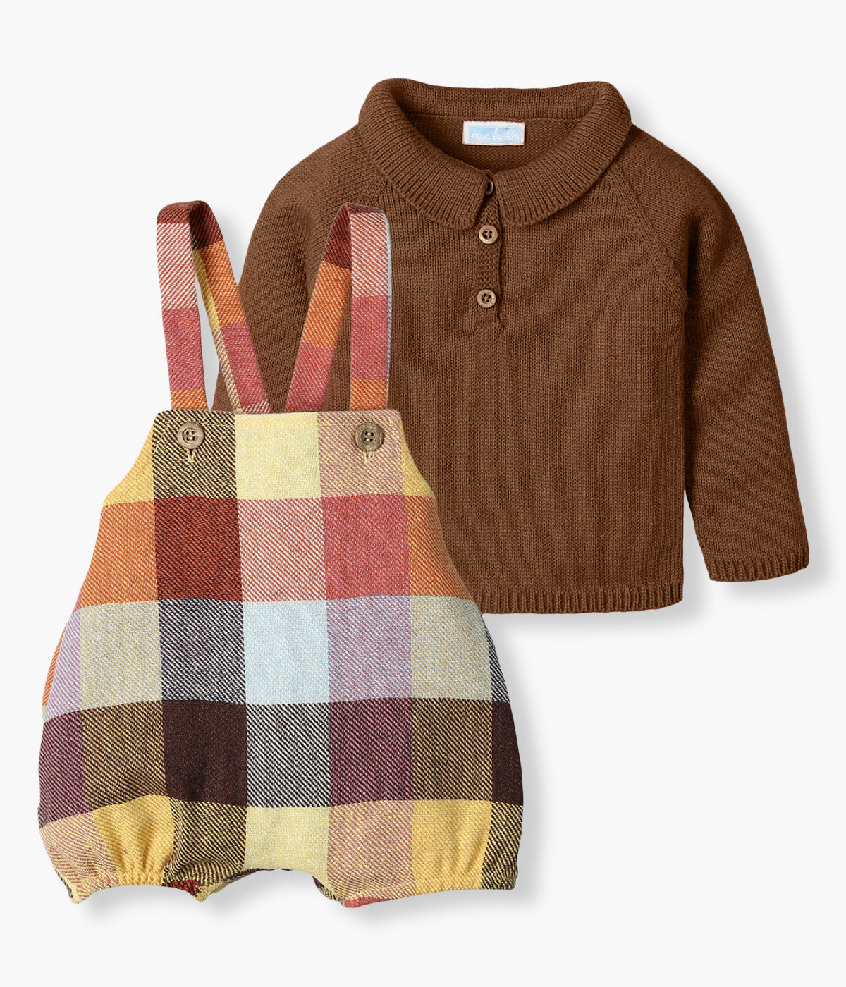 Conjunto de 2 peças em malha da Mac Ilusión composto por camisola e fofo para bebé e recém-nascido(a). Camisola castanha com gola bico e abertura no peito. Fofo com lã com padrão xadrez me tons de castanho e abertura nas alças.