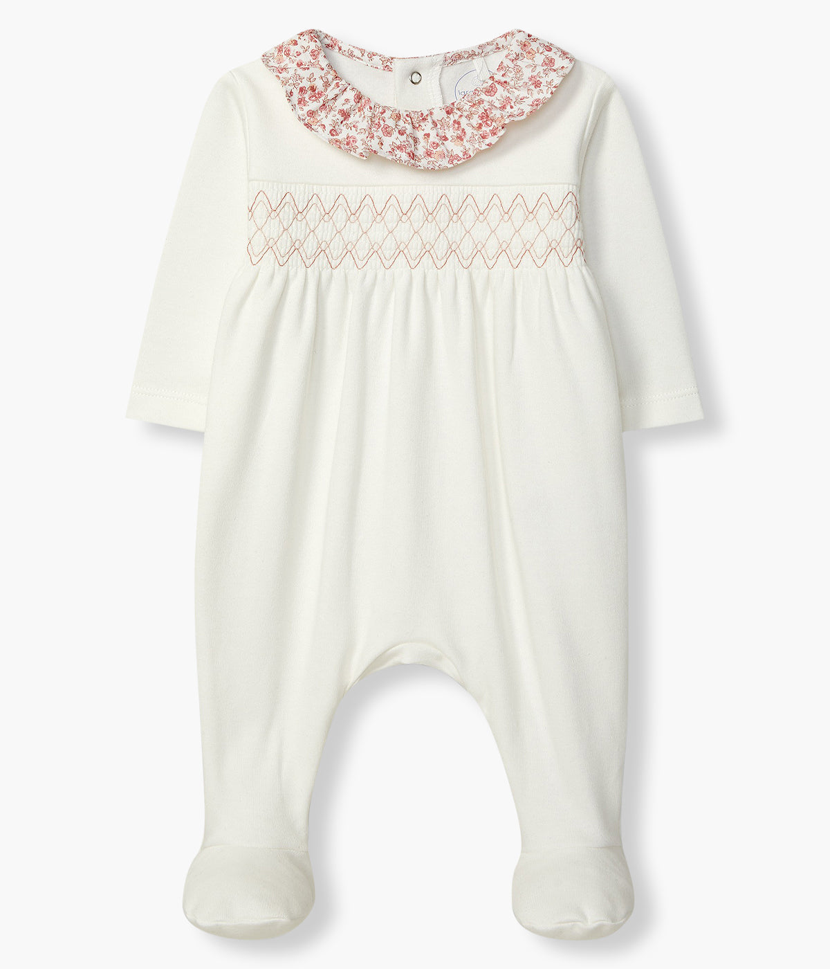 Babygrow pérola da Laranjinha para bebé menina e recém-nascida, 100% algodão. Gola folho com padrão floral e efeito favos no peito. Abertura nas costas e entrepernas.