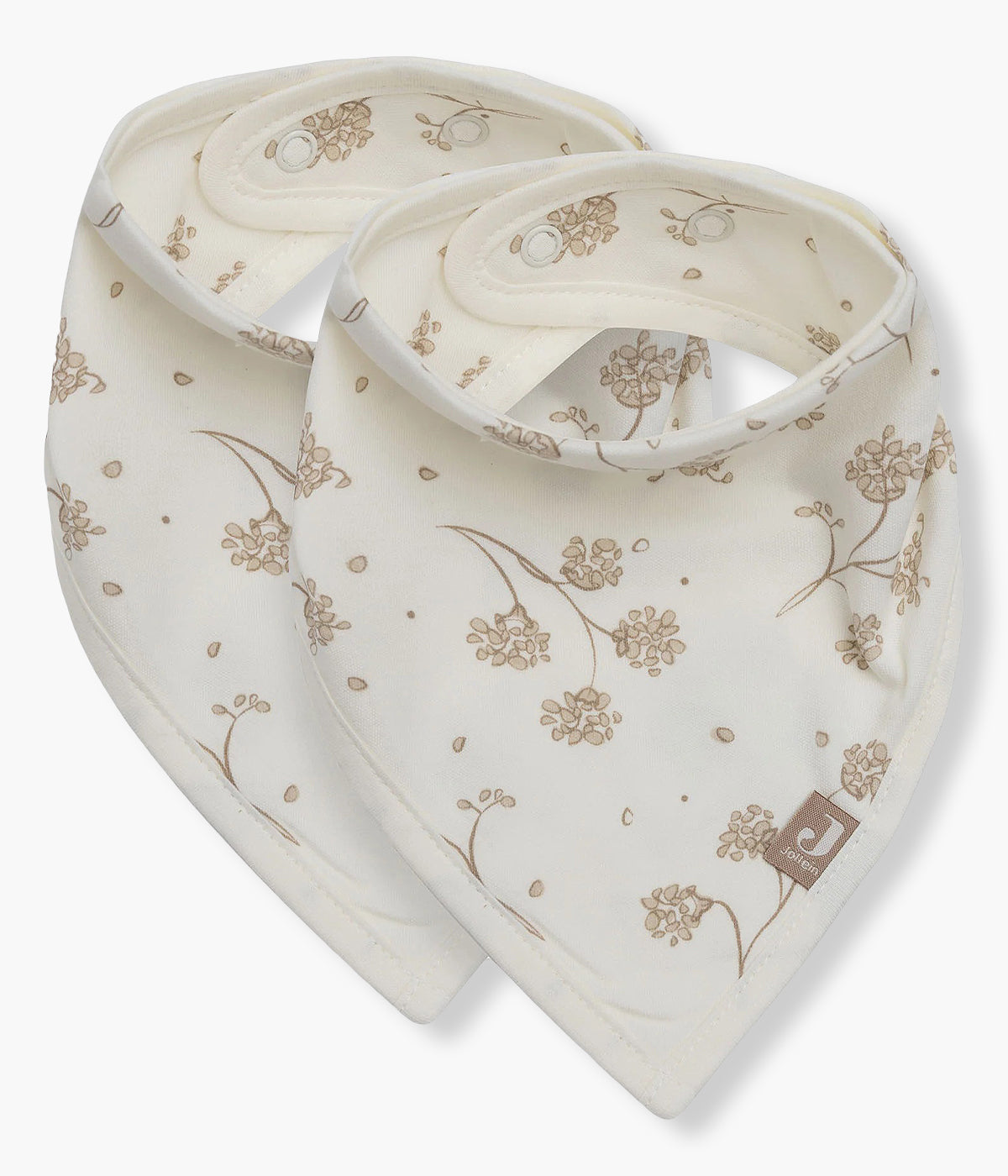 Pack composto por duas bandanas em algodão pérola com padrão dentes-de-leão em tons de bege para bebé e recém-nascido(a). Fecho com molas de pressão em duas medidas.