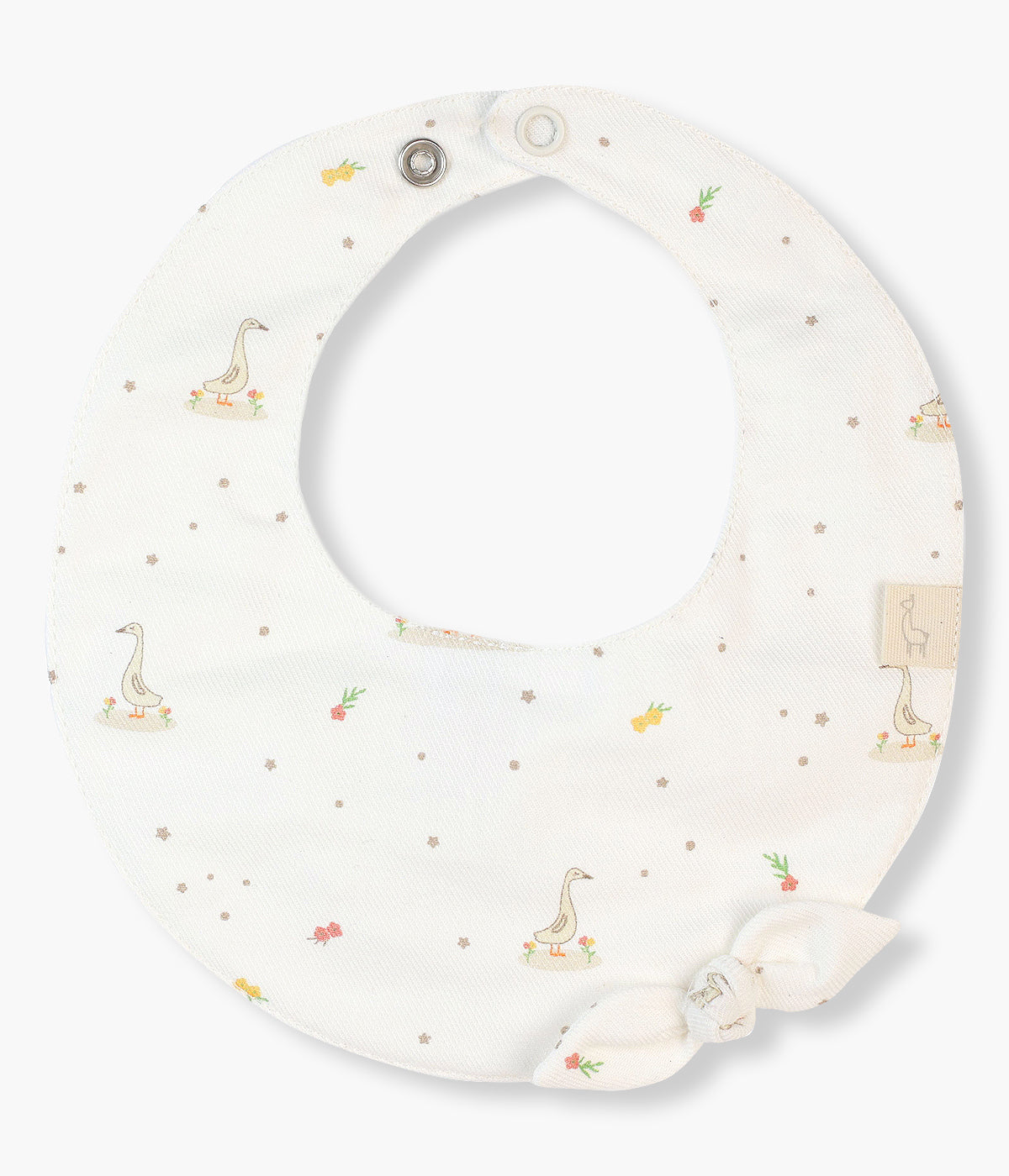 Babete impermeável pérola da Baby Gi para bebé e recém-nascido(a), 100% algodão. Elegante babete redonda com padrão gansos e laço a combinar.