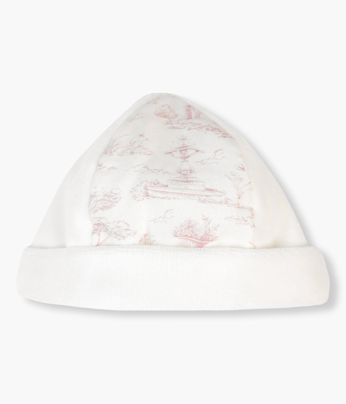 Gorro duplo em veludo pérola da Baby Gi para bebé menina e recém-nascida. Detalhe numa das faces com padrão toile de jouy em tons de rosa. Forro em algodão sem costuras.