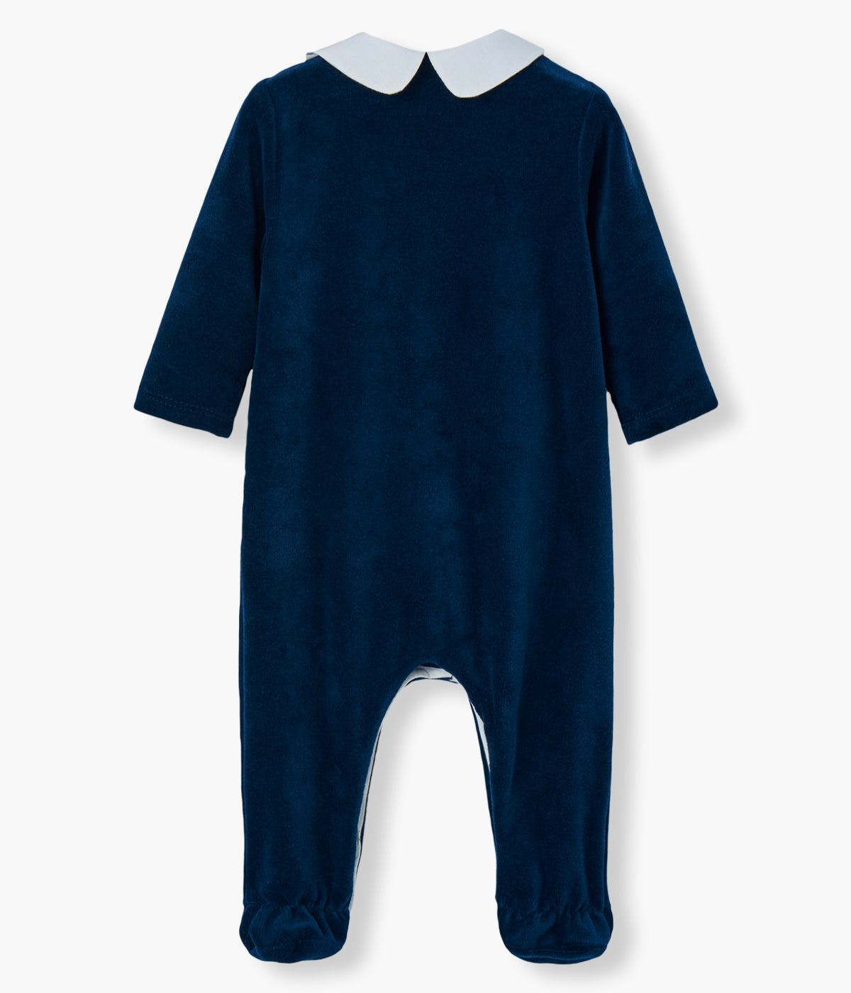Babygrow em veludo azul-marinho da Paz Rodríguez para bebé e recém-nascido(a) adequado para natal. Elegante babygrow com gola redonda cortada branca com bordado cerejas, laço e faixa na abertura em bordô. Abertura na frente.