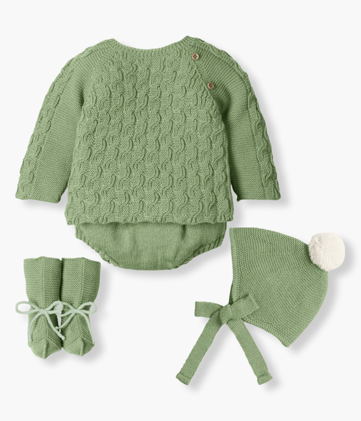 Conjunto de 4pc da Mac Ilusión composto por camisola, tapa fraldas, gorro e carapins para bebé e recém-nascido(a). Camisola com tricotado efeito entrelaçado. Tapa fraldas a combinar. Gorro com pompom pérola. Carapins tipo bota com cordões.
