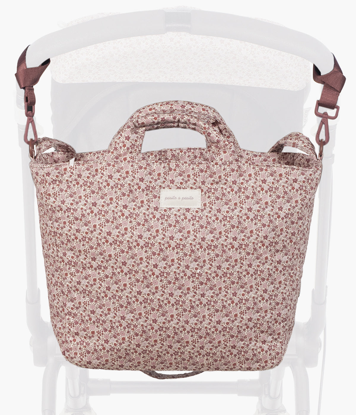 Bolsa de passeio Cherry Flowers da Pasito a Pasito pendurada no carrinho de bebé.