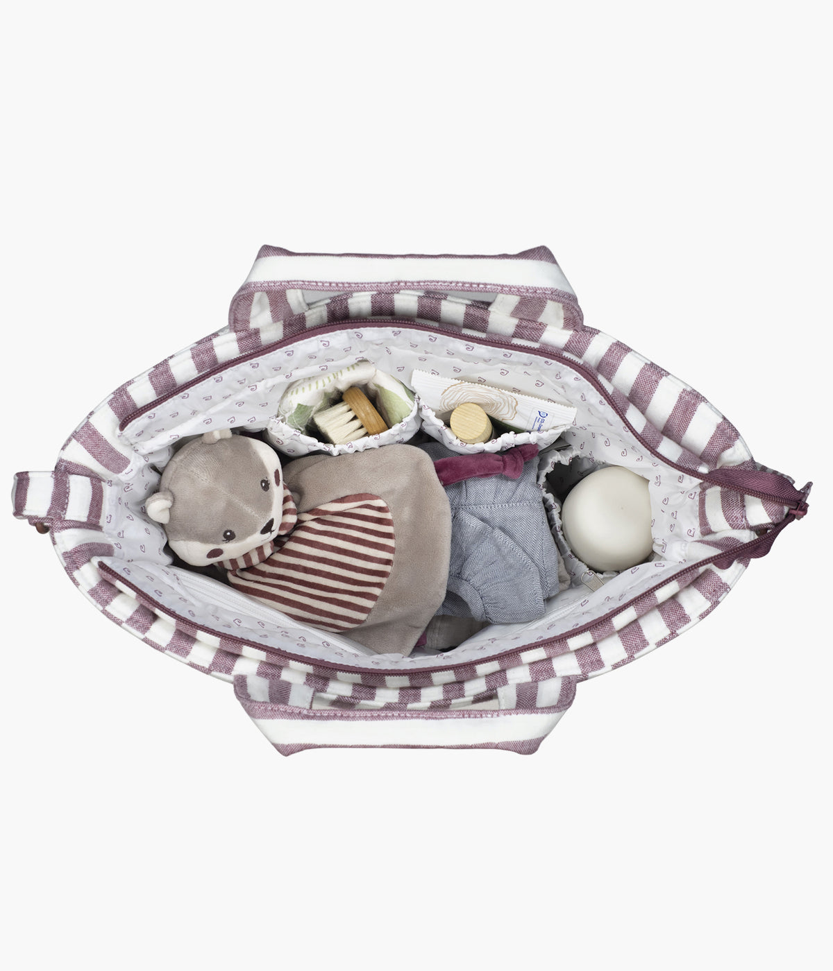 Bolsa de passeio Cherry Strips da Pasito a Pasito aberta e com coisas de bebé no interior.