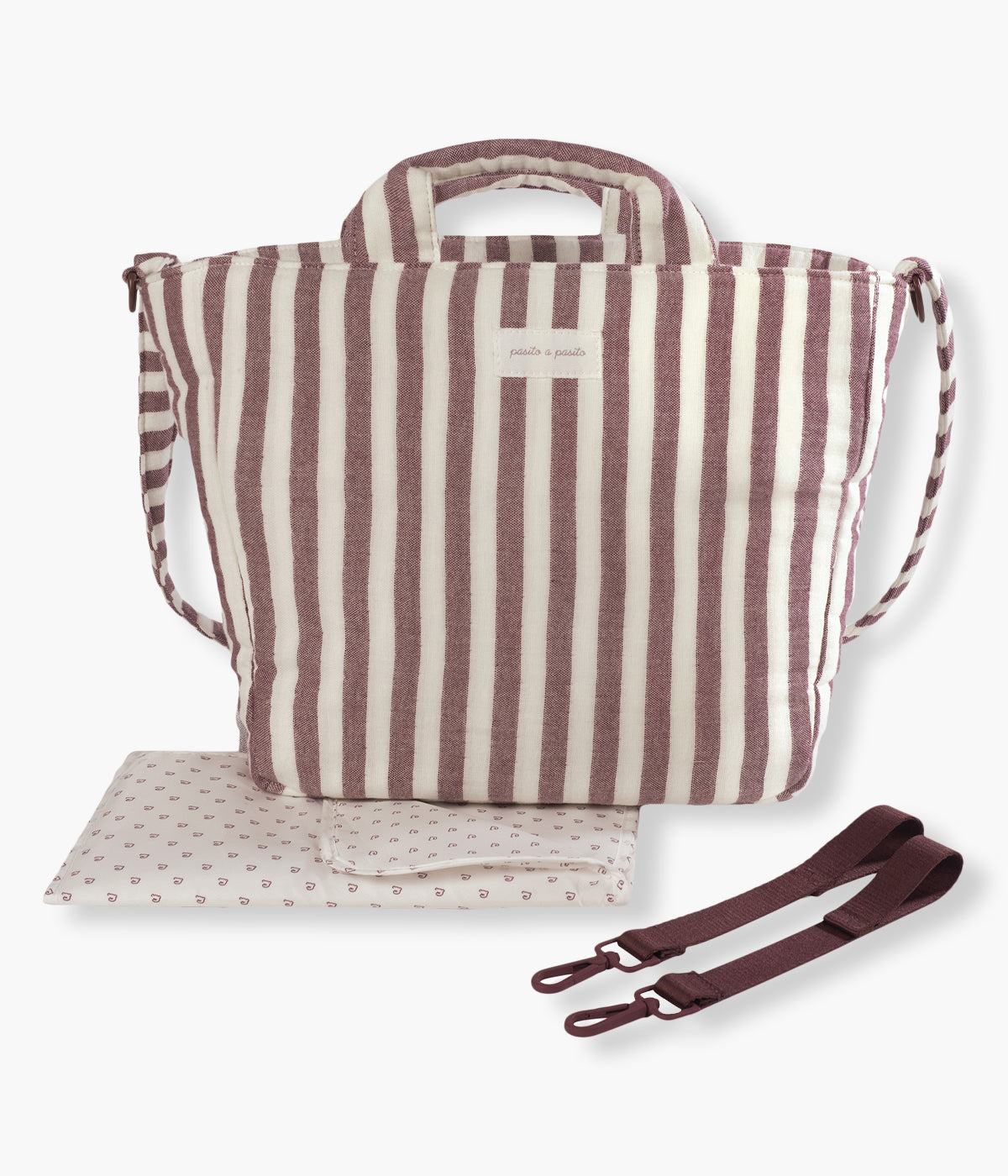 Bolsa de passeio Cherry Strips da Pasito a Pasito com exterior em algodão impermeável de padrão riscas em tons de cereja e branco. Charmosa e prática, pensada para mães que procuram uma bolsa funcional sem excluir a elegância.