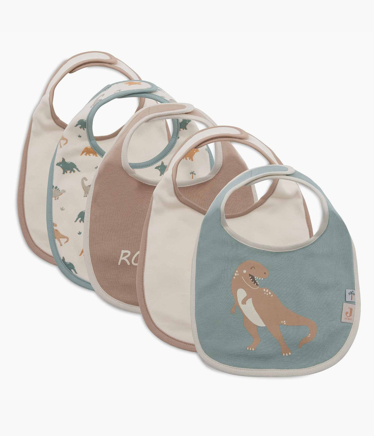Pack de 5 babetes impermeáveis Roarsome da Jollein, 100% algodão. Perfeitas para as refeições do bebé, possuem um fecho em velcro para colocar e retirar facilmente. Práticas babetes que mantêm a roupa limpa e seca, combinando funcionalidade e um toque encantador com padrões alusivos aos dinossauros.