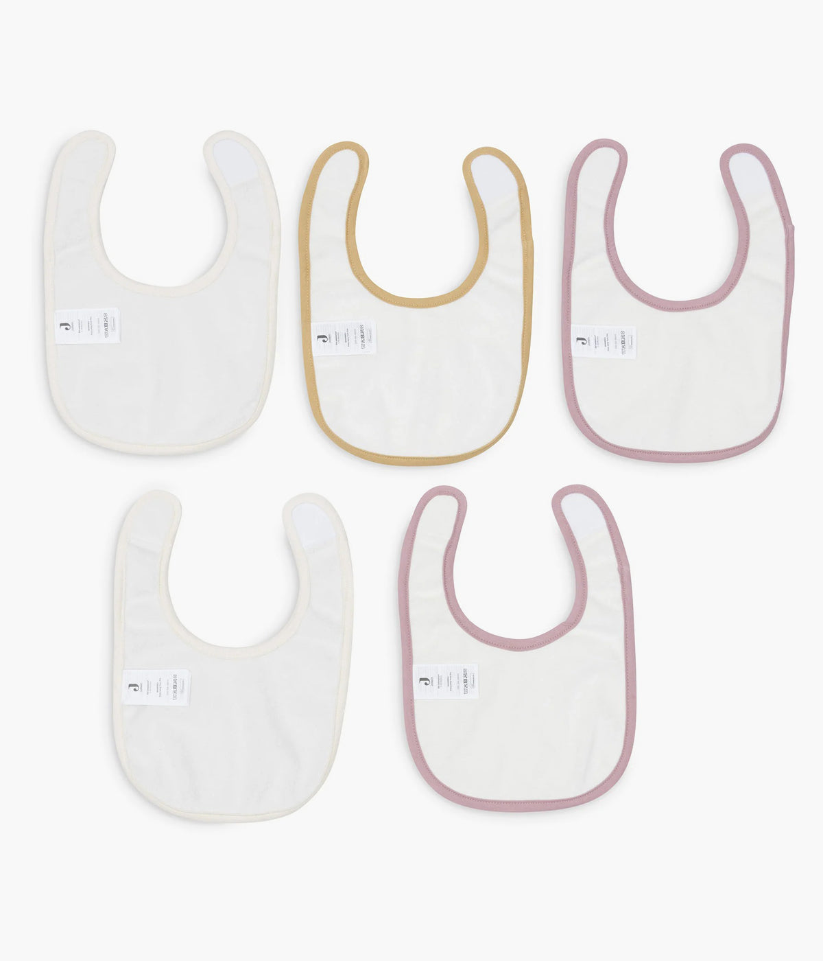 Pack de 5 Babetes Impermeáveis Flower Fairies da Jollein, 100% algodão. Perfeitas para as refeições do seu bebé, possuem um fecho em velcro para colocar e retirar facilmente. Práticas babetes que mantêm a roupa limpa e seca, combinando funcionalidade e um toque encantador com os seus adoráveis padrões.