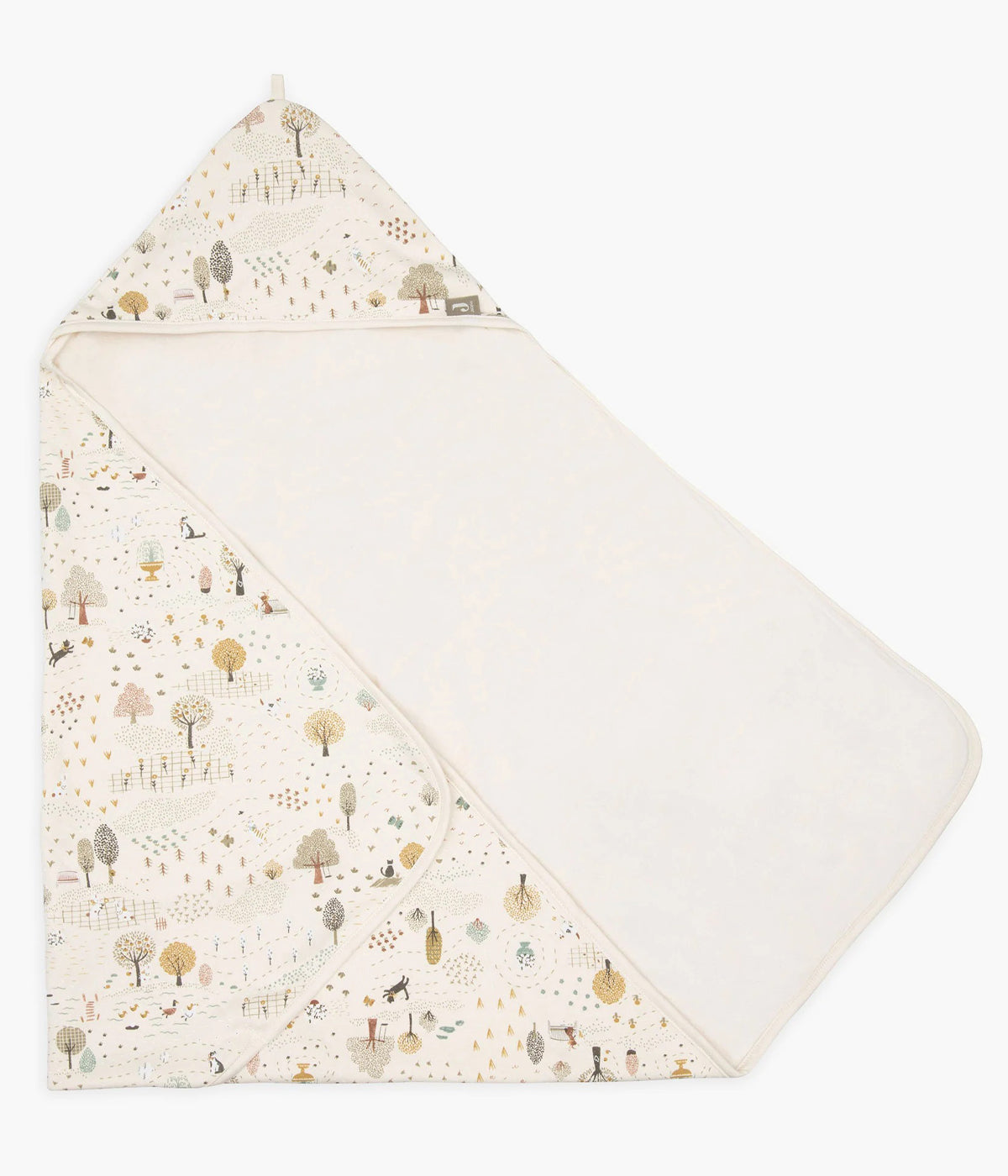 Toalha de banho em algodão para bebé e recém-nascido(a) coleção Tiny Park da Jollein. Tecido de algodão turco muito absorvente de cor pérola e exterior com padrão animais e árvores. Carapuço no canto.