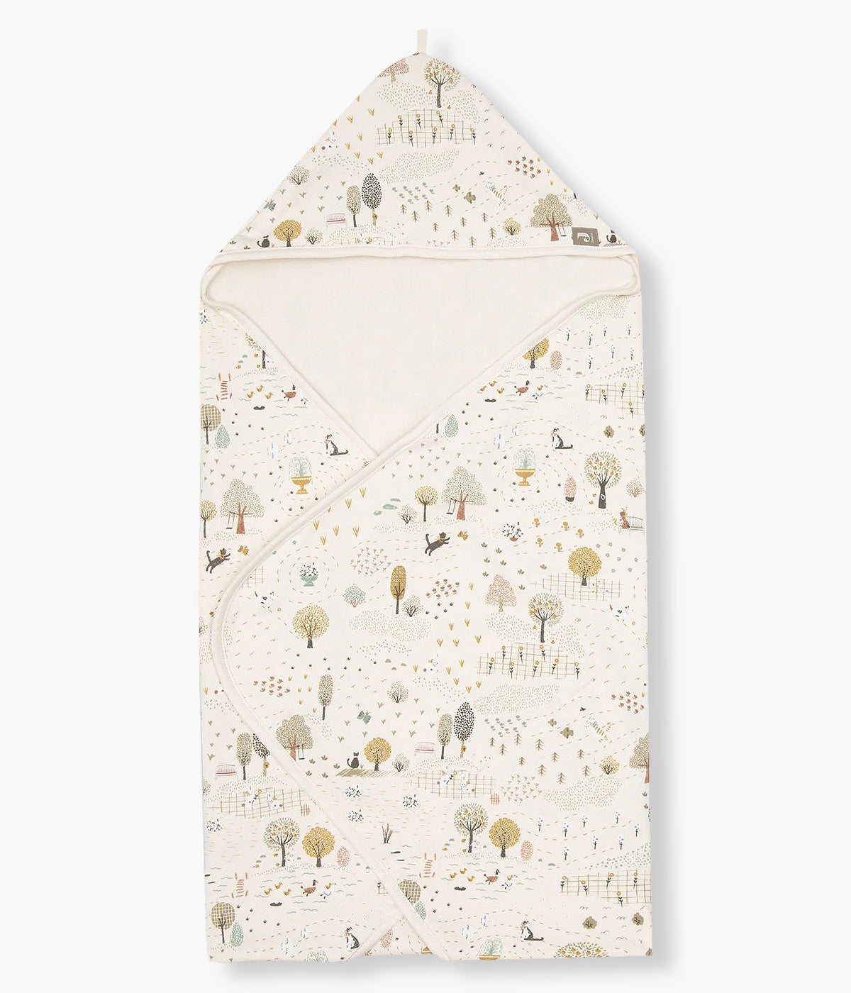 Toalha de banho em algodão para bebé e recém-nascido(a) coleção Tiny Park da Jollein. Tecido de algodão turco muito absorvente de cor pérola e exterior com padrão animais e árvores. Carapuço no canto.