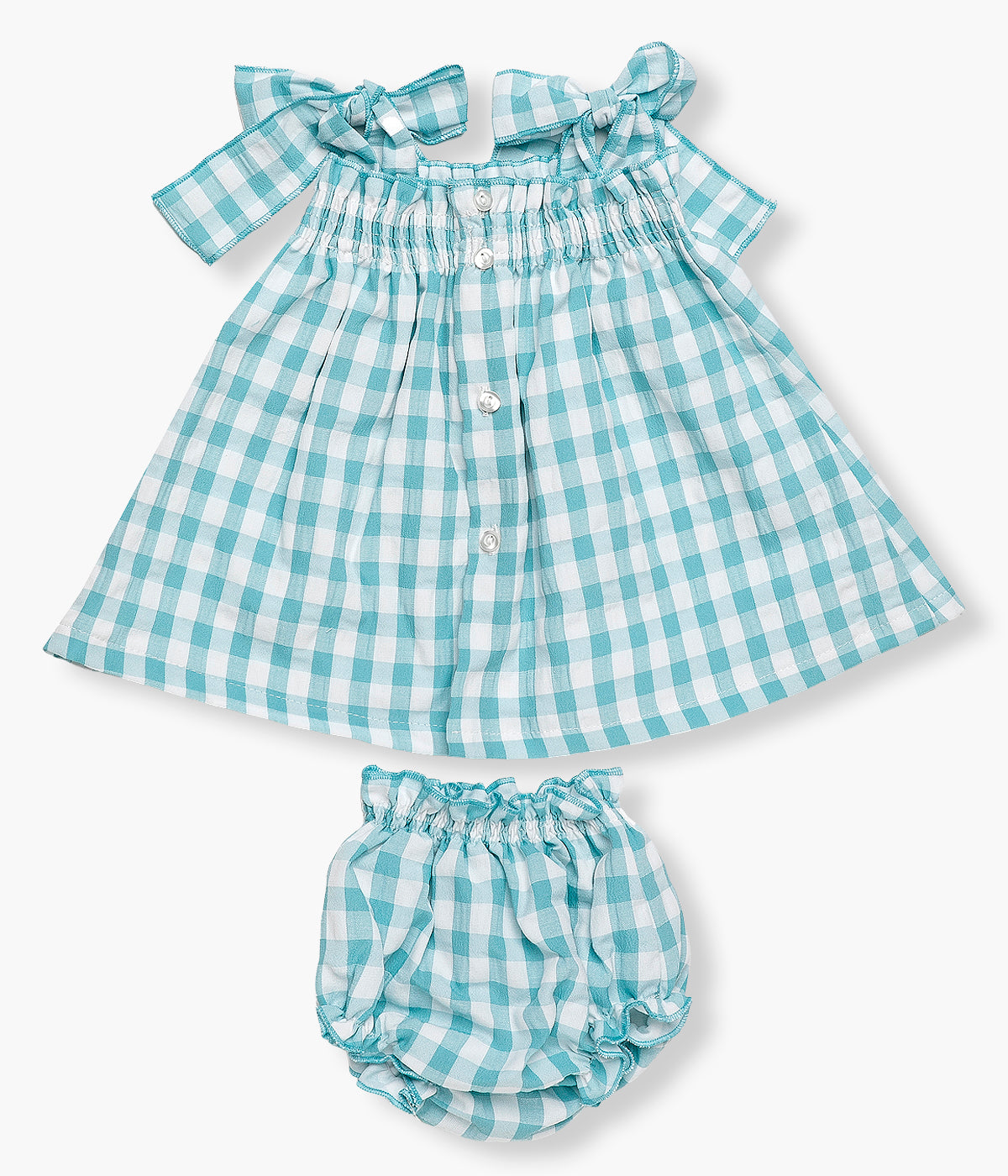 Vista de costas do conjunto com padrão vichy azul da Juliana para bebé menina e recém‑nascida, composto por vestido e tapa fraldas. Vestido de alças com laços nos ombros e elástico no peito. Tapa fraldas a combinar.