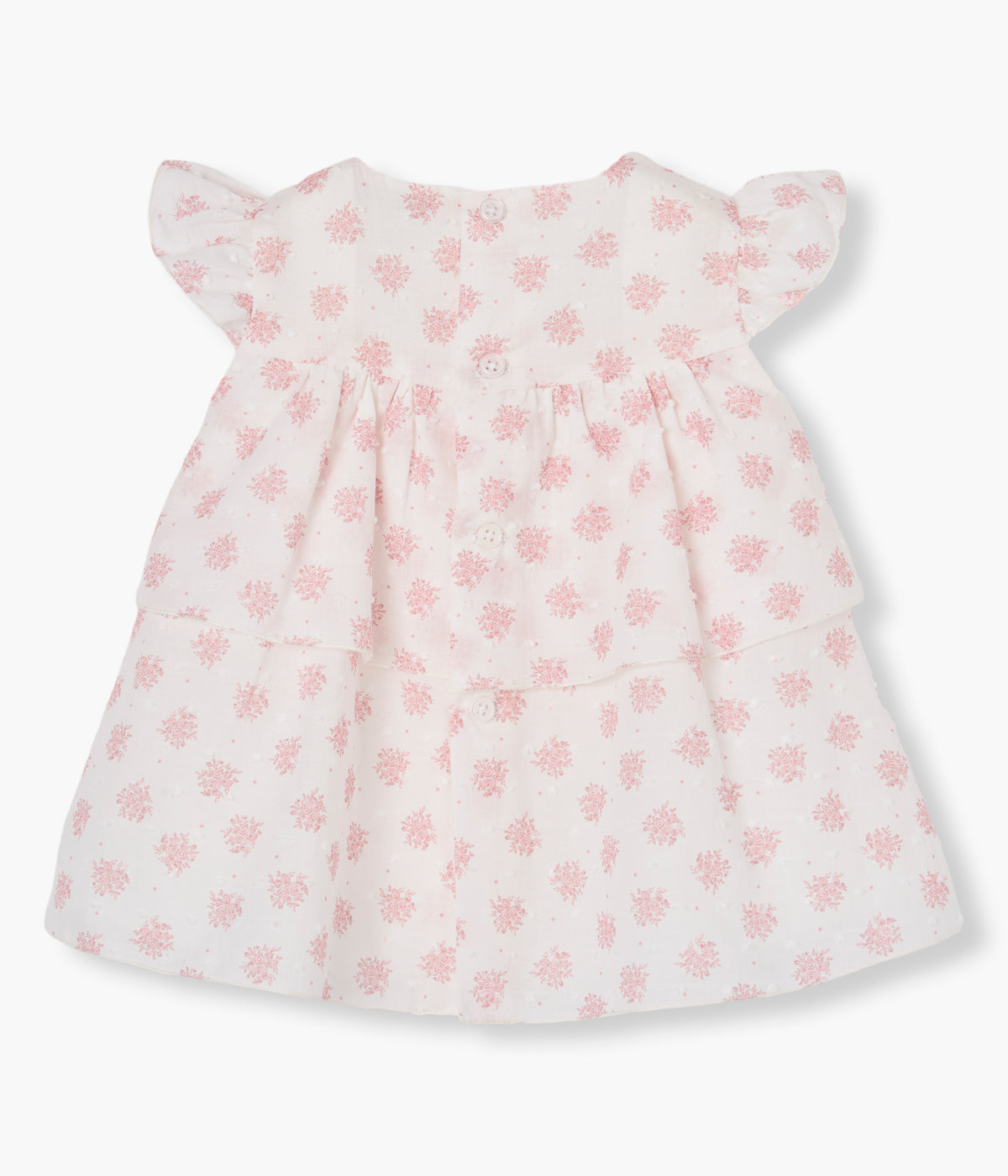 Vista de costas do vestido e tapa fraldas branco da Paz Rodríguez para bebé menina e recém-nascida, 100% algodão.