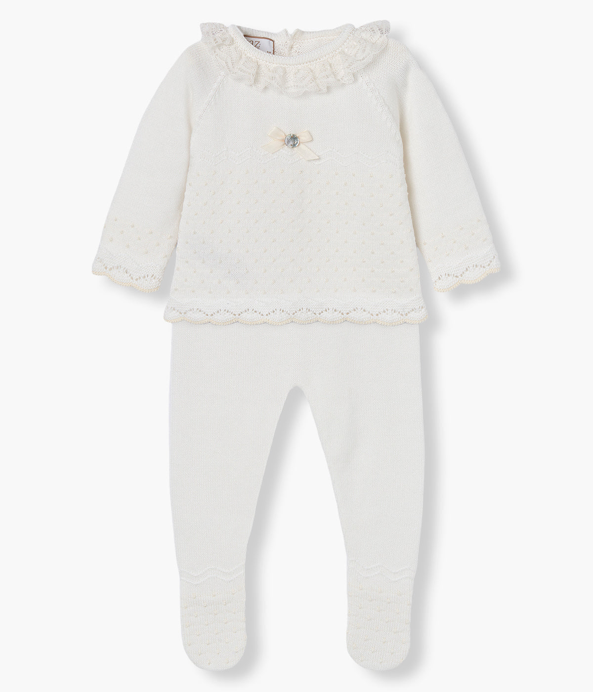 Vista de frente do conjunto de 2 peças composto por camisola e calças em malha de algodão pérola da Paz Rodríguez para bebé e recém-nascido(a).